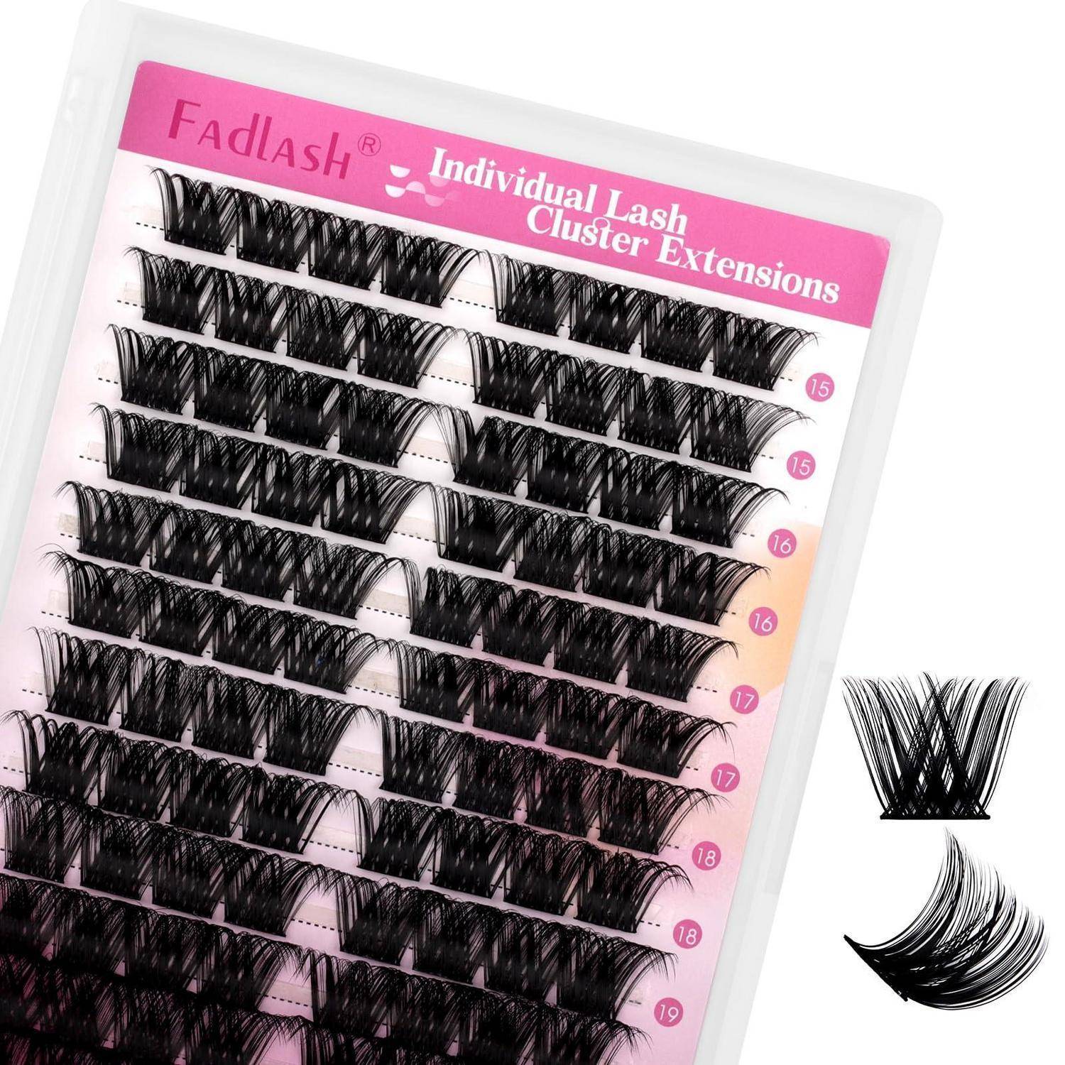Packung schwarzer individueller Wimpernbüschel-Extensions auf einem rosa beschrifteten Tablett, mit Beispielwimpernbüscheln daneben gezeigt.