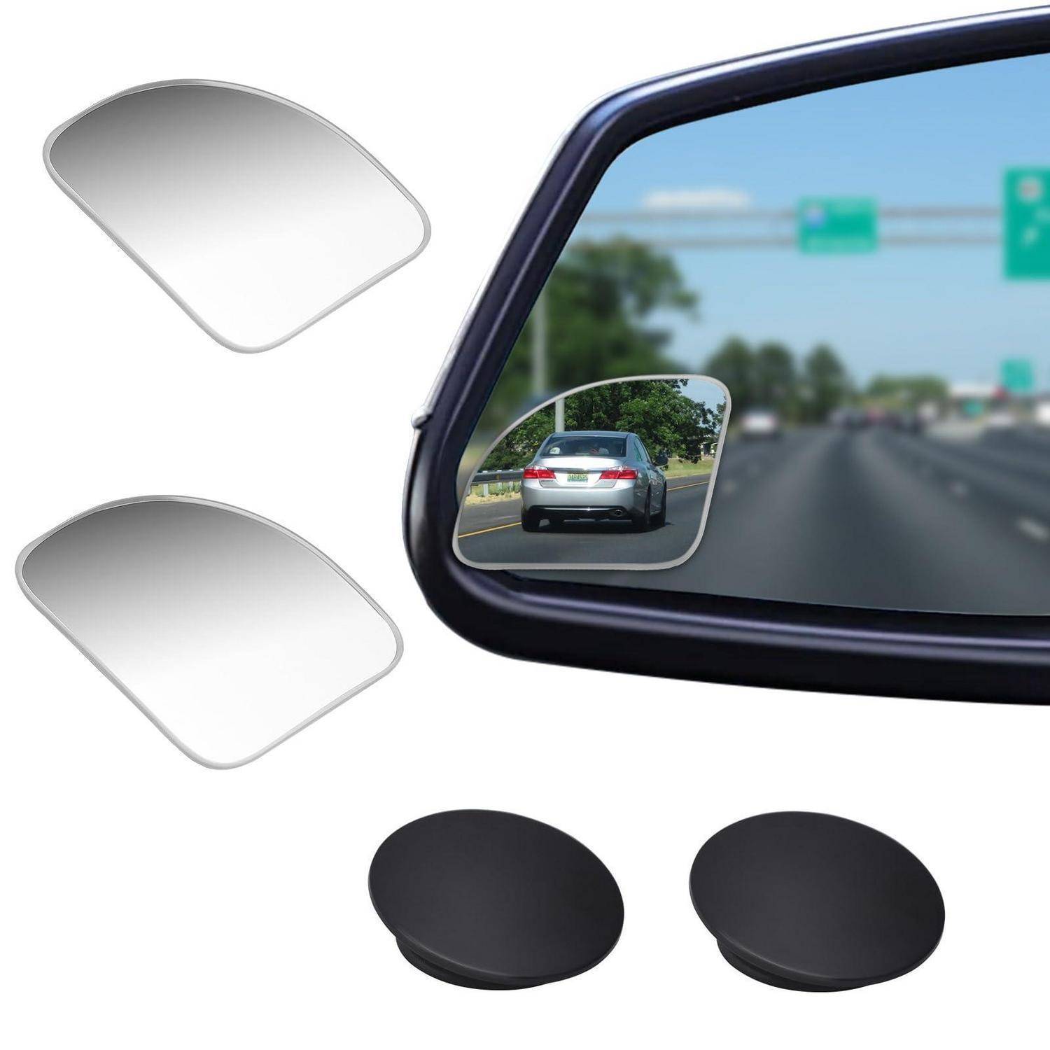 Außenspiegelaufsatz mit zwei kleinen Toter-Winkel-Spiegelaufklebern in Silber und Schwarz, plus ein Beispiel eines davon, der ein dahinter fahrendes Auto spiegelt.