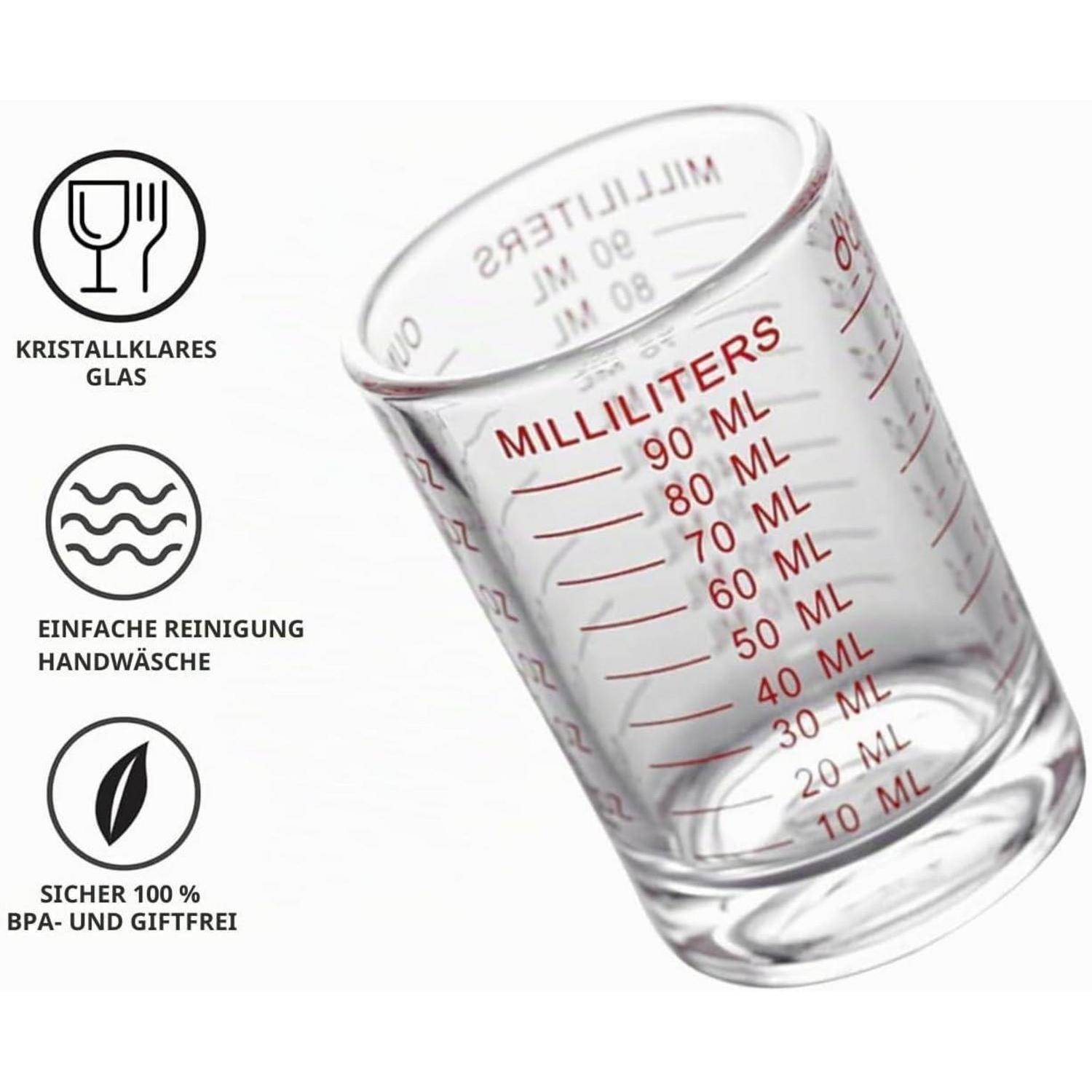 Klares Glasm­essbecher mit Markierungen in Milliliter bis 90 ml, mit Symbolen für einfaches Handwaschen und 100% BPA- und toxinfrei.