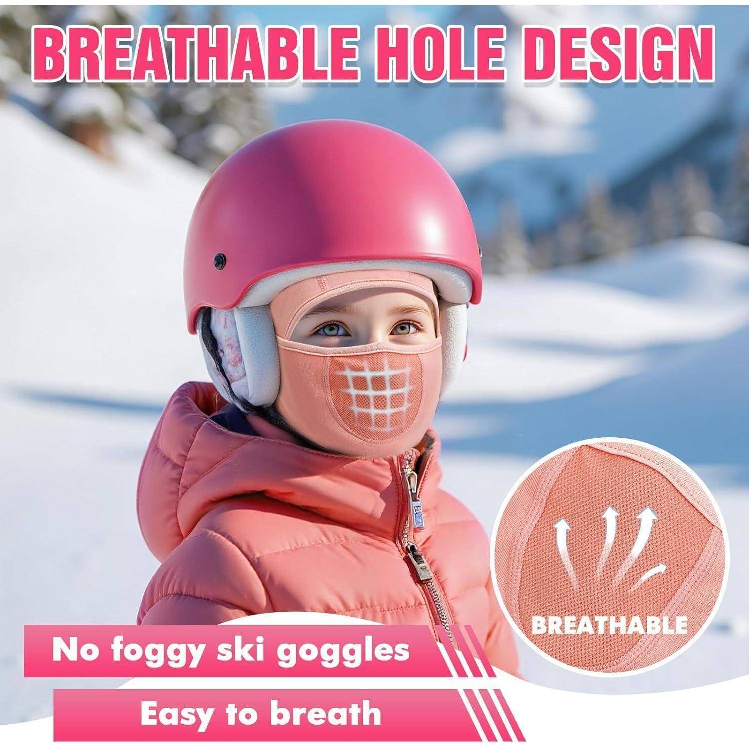 Kind in rosa Skihelm und Gesichtsmaske mit atmungsaktivem Lochdesign; Text besagt „Keine beschlagenen Ski-Schutzbrille