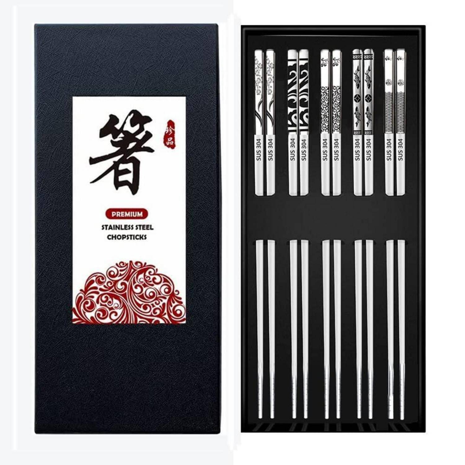 Schwarze Geschenkbox mit Premium-Edelstahl-Stäbchen, mit Etikett und offenstehendem Tablett mit mehreren gemusterten Paaren im Inneren.