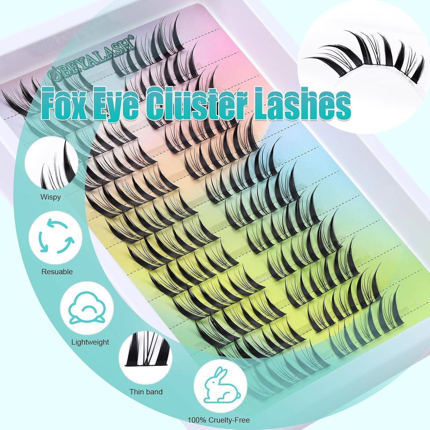 Werbebild von Fox-Eye-Cluster-Wimpern auf einem Pastell-Tablett, das verschiedene Wimpernstreifen-Cluster mit Etiketten für luftig, wiederverwendbar, leicht, dünnes Band und 100% tierversuchsfrei zeigt.