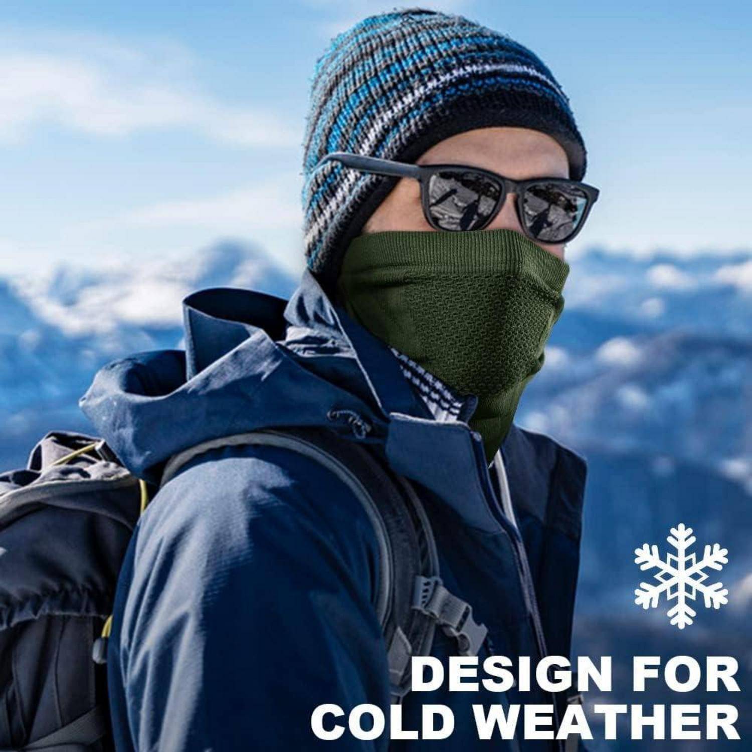 Person in Winterkleidung mit Sonnenbrille und Gesichtsschutz, im Freien in verschneiten Bergen, mit Text "DESIGN FÜR KALTES WETTER"".