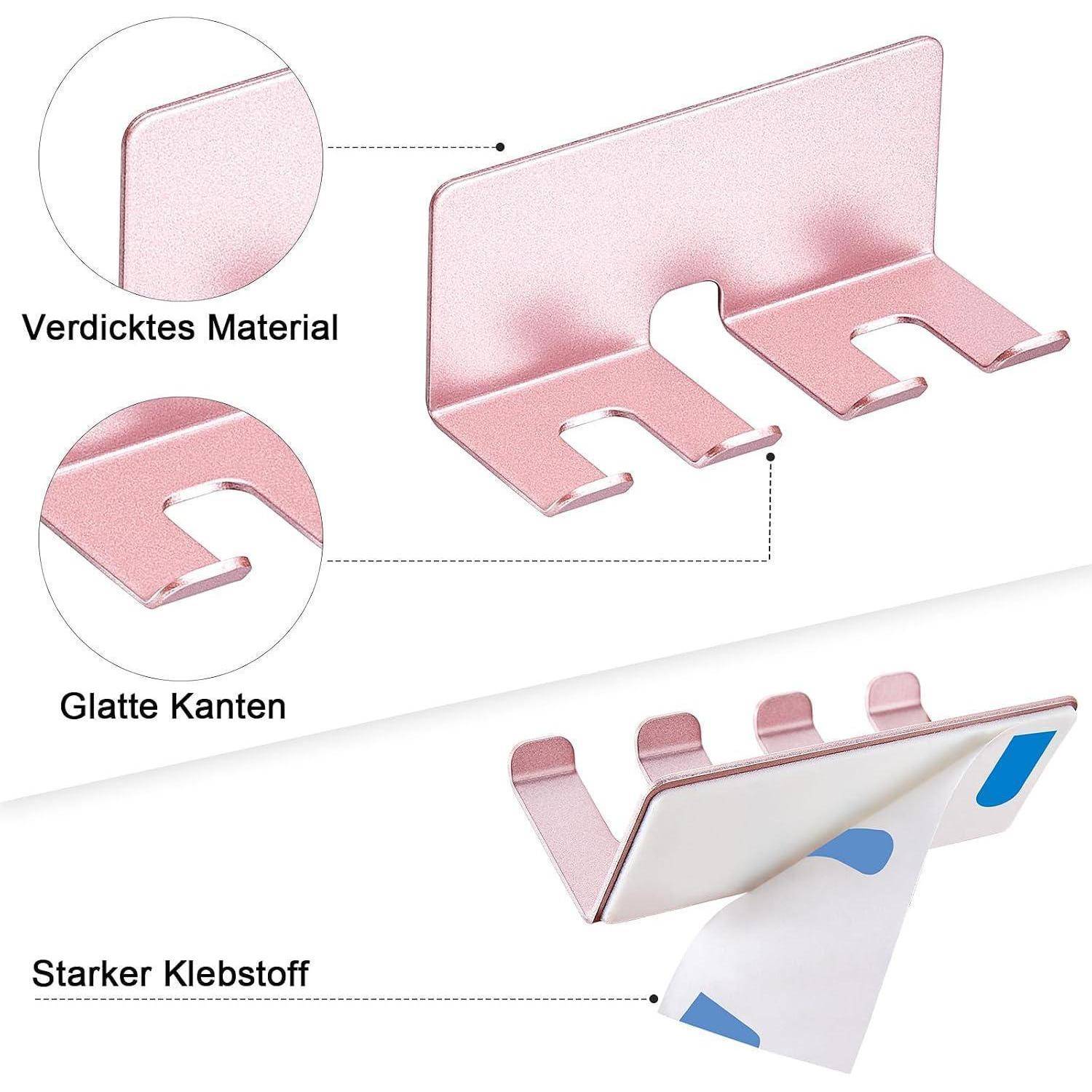 Illustration eines rosa Metallwandhakens mit verdicktem Material, glatten Kanten und starker Klebstoffrückseite; deutsche Beschriftungen heben diese Merkmale hervor.