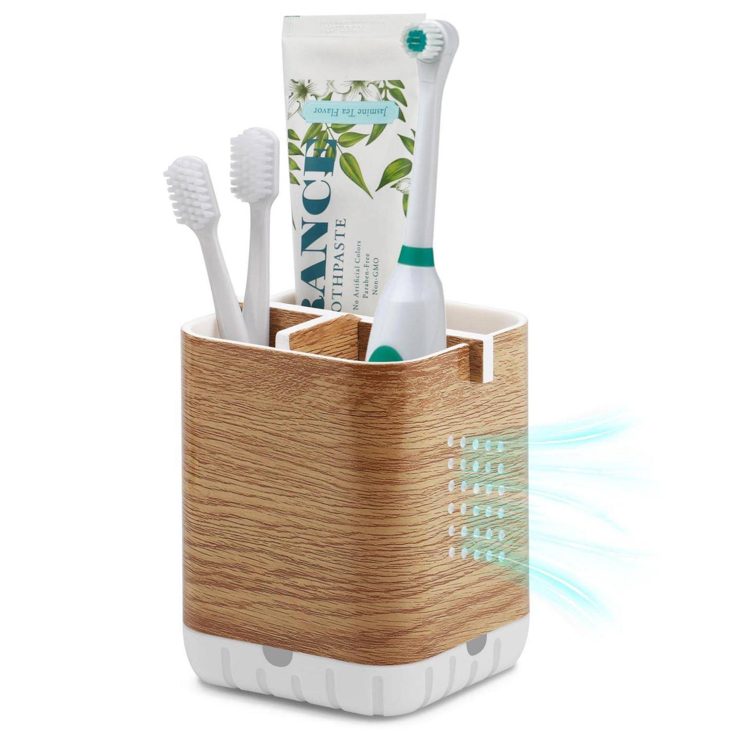 Badezimmerorganizer im Holzlook, der eine elektrische Zahnbürste, zwei manuelle Zahnbürsten und eine Zahnpastatube hält, mit Belüftungsschlitzen an der Seite.