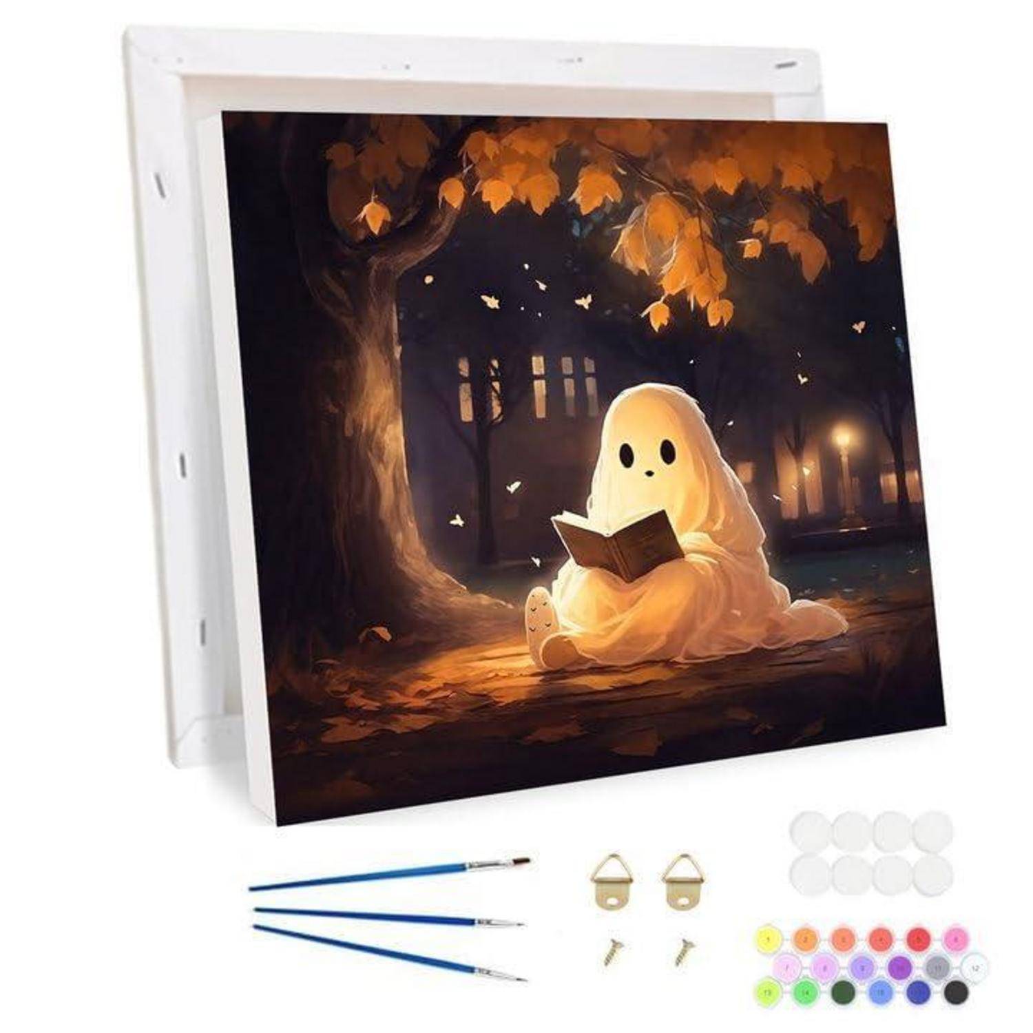 DIY-Leinwand-Mal-Set mit einem Geist, der ein Buch unter Herbstblättern liest, plus Pinsel und Aufhängehardware.