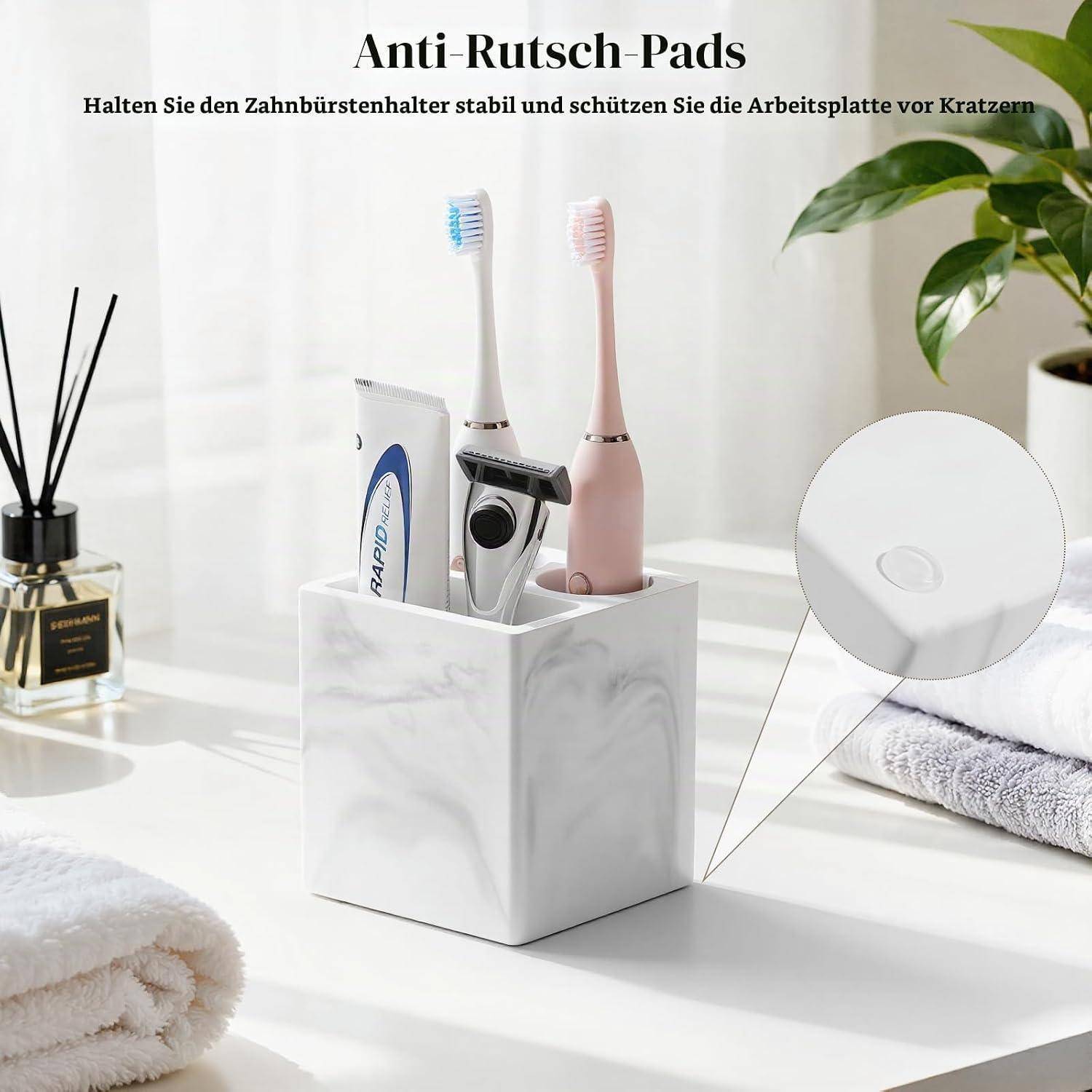 Zahnbürstenhalter mit rutschfesten Pads, gezeigt auf einer Badezimmerablage mit Zahnbürsten und Zahnpasta; Ausschnitt zeigt die Pad-Details.