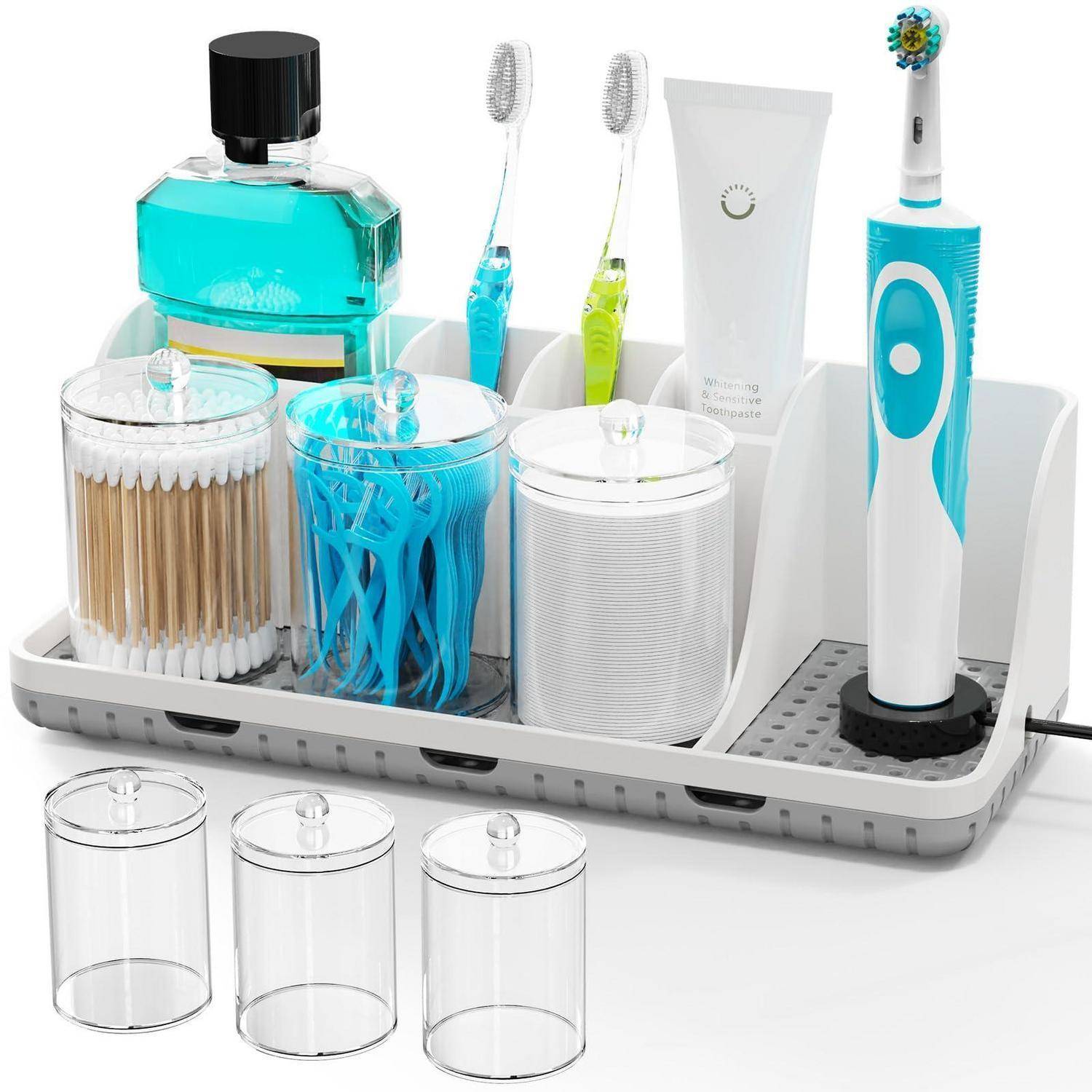 Badezimmer-Arbeitsplatte-Organizer, der Zahnbürsten, Mundwasser, Zahnpasta, Wattestäbchen und durchsichtige Lagerbehälter hält.