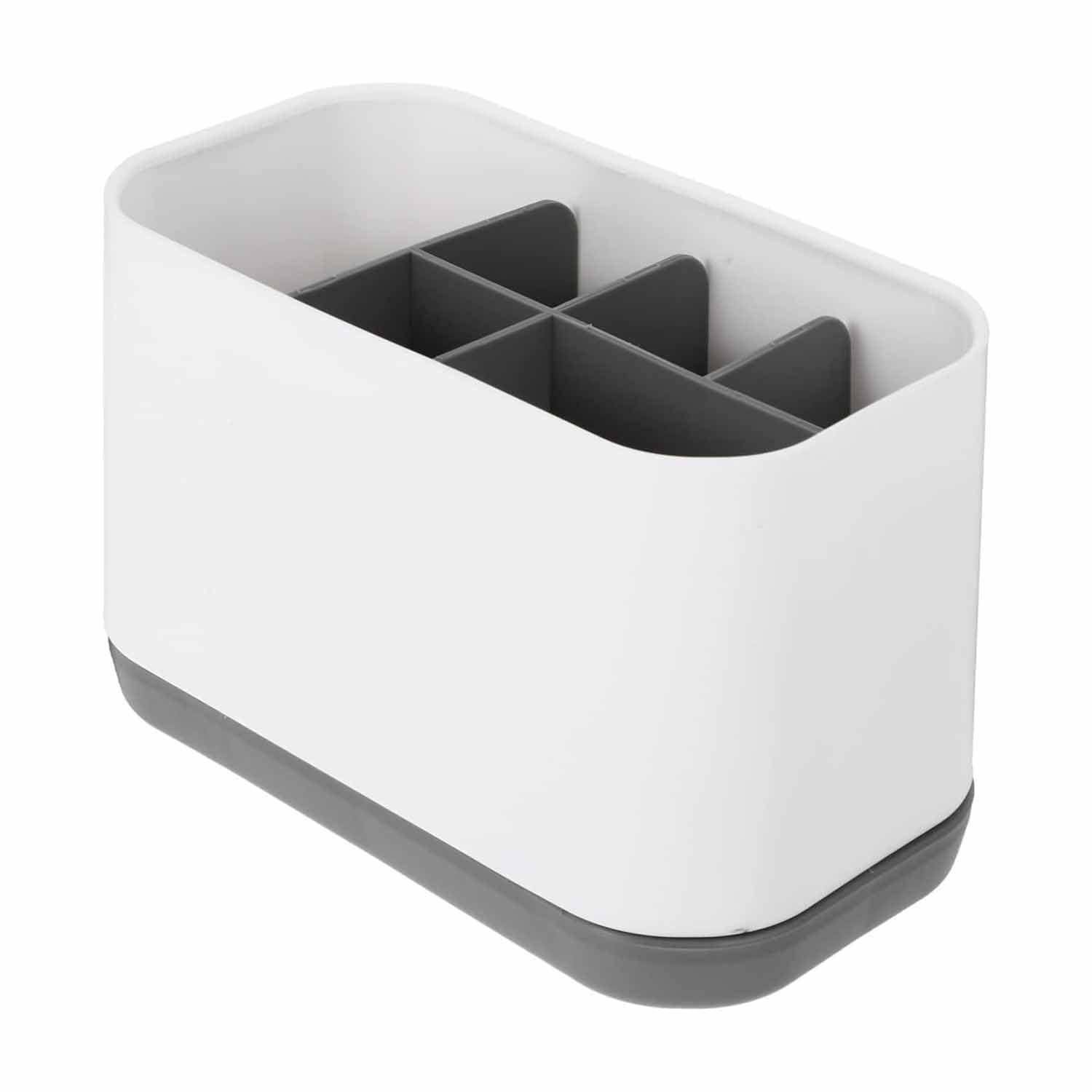 Weiße Arbeitsplatte-Utensil-Organizer mit grauer Basis und Trennwänden, isoliert auf weißem Hintergrund dargestellt.