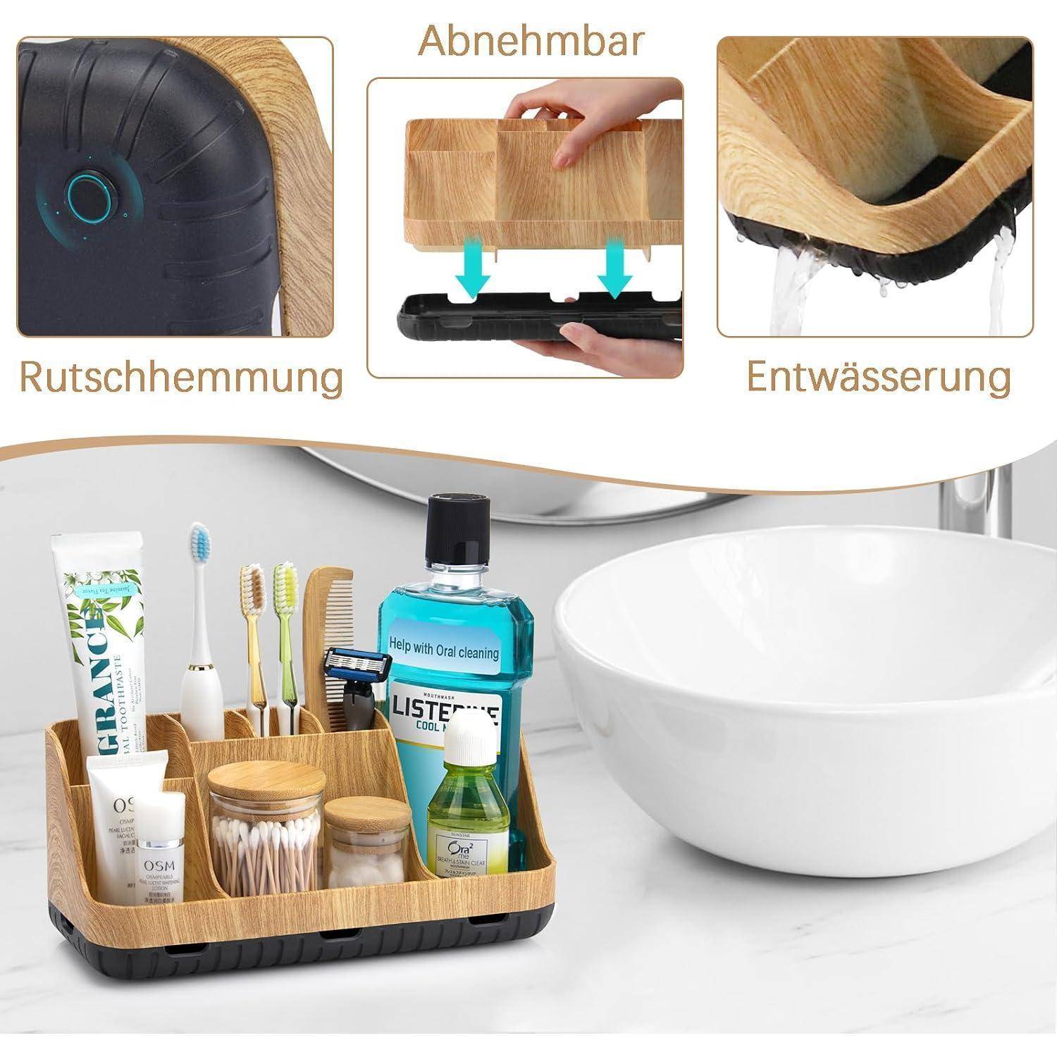 Badezimmer-Organizer-Tablett mit rutschfester Basis, austauschbarem Bamboo-Einsatz und Entwässerung; gezeigt mit Toilettenartikeln neben einem weißen Waschbecken.