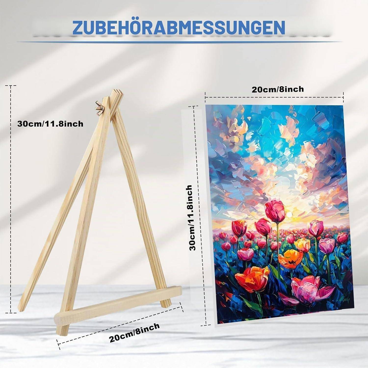 Produktgrößen-Diagramm eines Holz-Staffelei im A-Rahmen, 30 cm hoch und 20 cm breit, mit einem 20 x 30 cm Leinwandgemälde mit bunten Blumen.