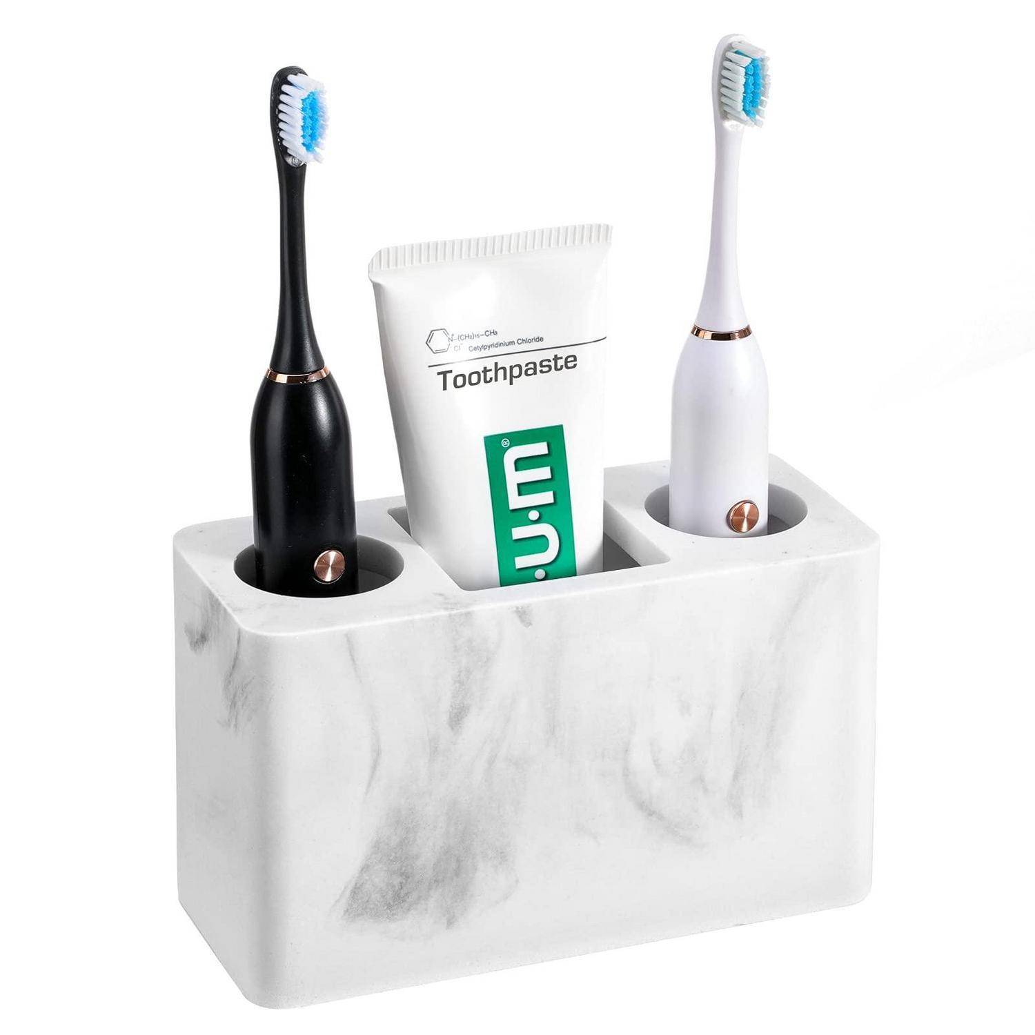 Badezimmer-Organizer im Marmor-Look mit drei Fächern für zwei elektrische Zahnbürsten und eine Zahnpastatube.