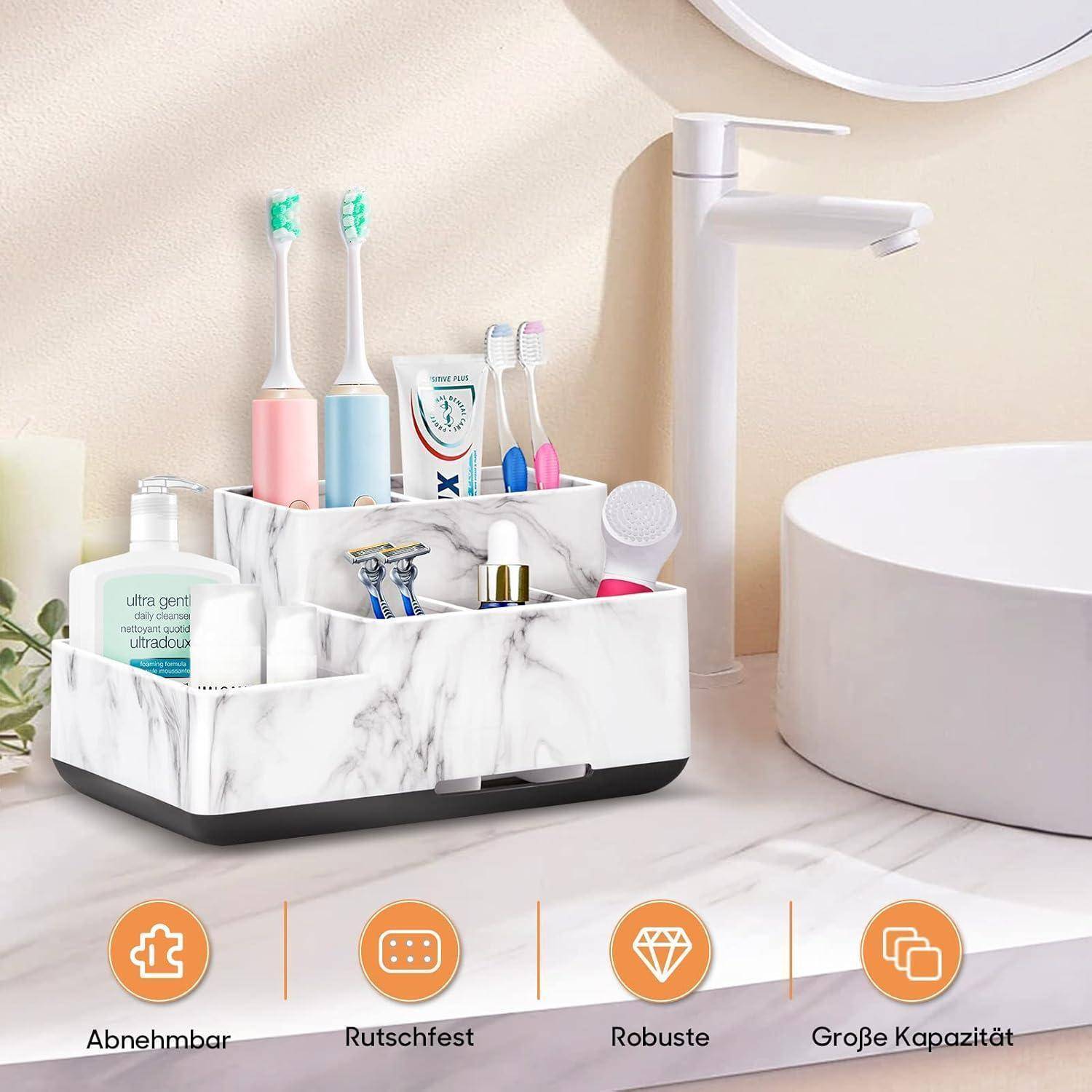 Organisierter Badezimmer-Waschtisch mit Marmor-Optik, der Zahnbürsten, Zahnpasta, Rasierer und kleine Gegenstände neben einem Waschbecken hält; Symbole kennzeichnen ihn als abnehmbar, rutschfest, langlebig und mit großem Fassungsvermögen.