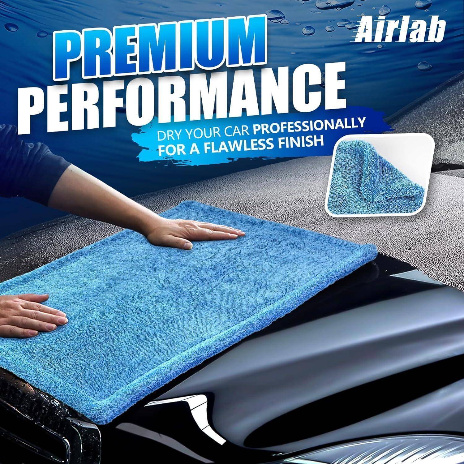 Werbegrafik für Airlab, die Hände zeigt, die ein Auto mit einem blauen Mikrofasertuch trocknen, mit dem Text „PREMIUM PERFORMANCE