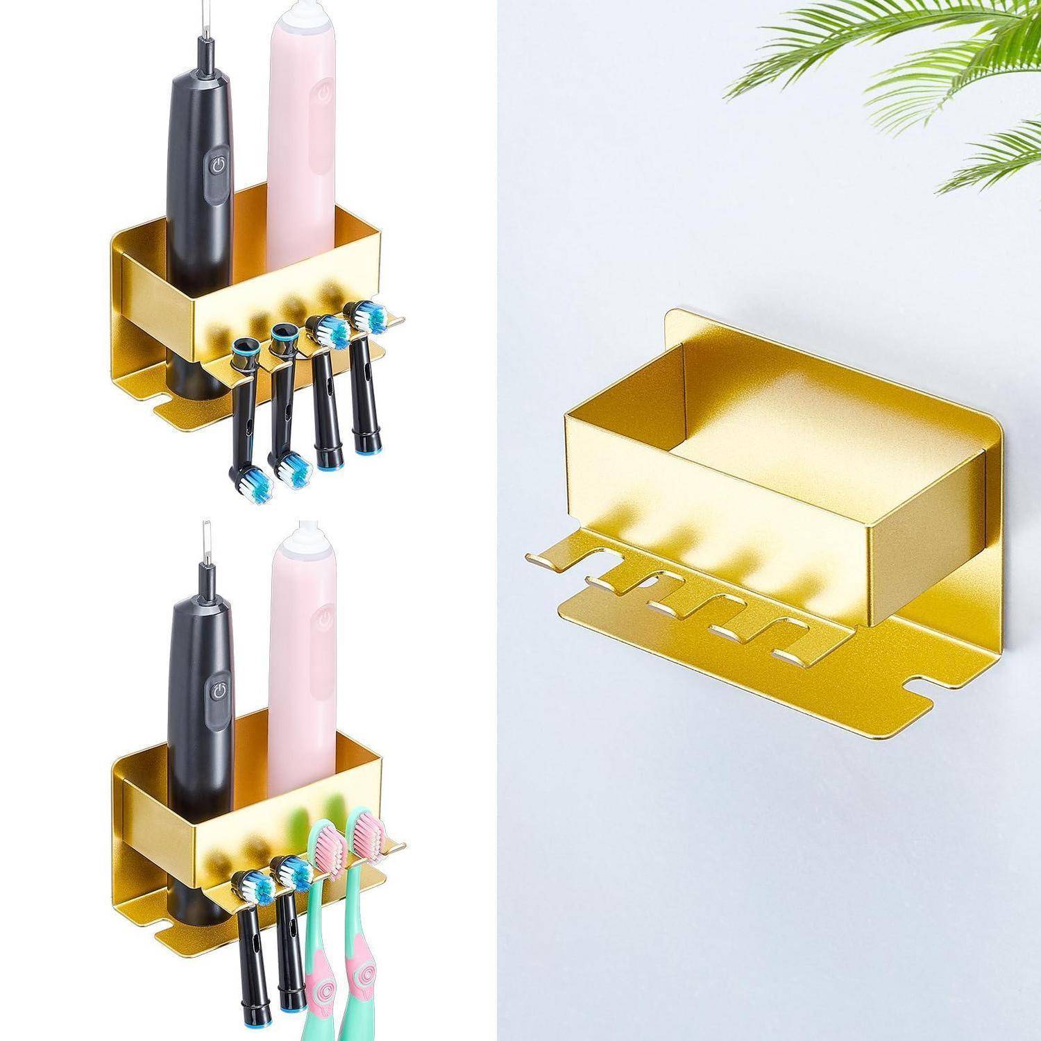 Wandmontierter Badezimmerorganizer aus Gold mit einer elektrischen Zahnbürste, Zahnpasta und mehreren Zahnbürsten; ein Panel zeigt den leeren Halter und die Befestigungssteckplätze.