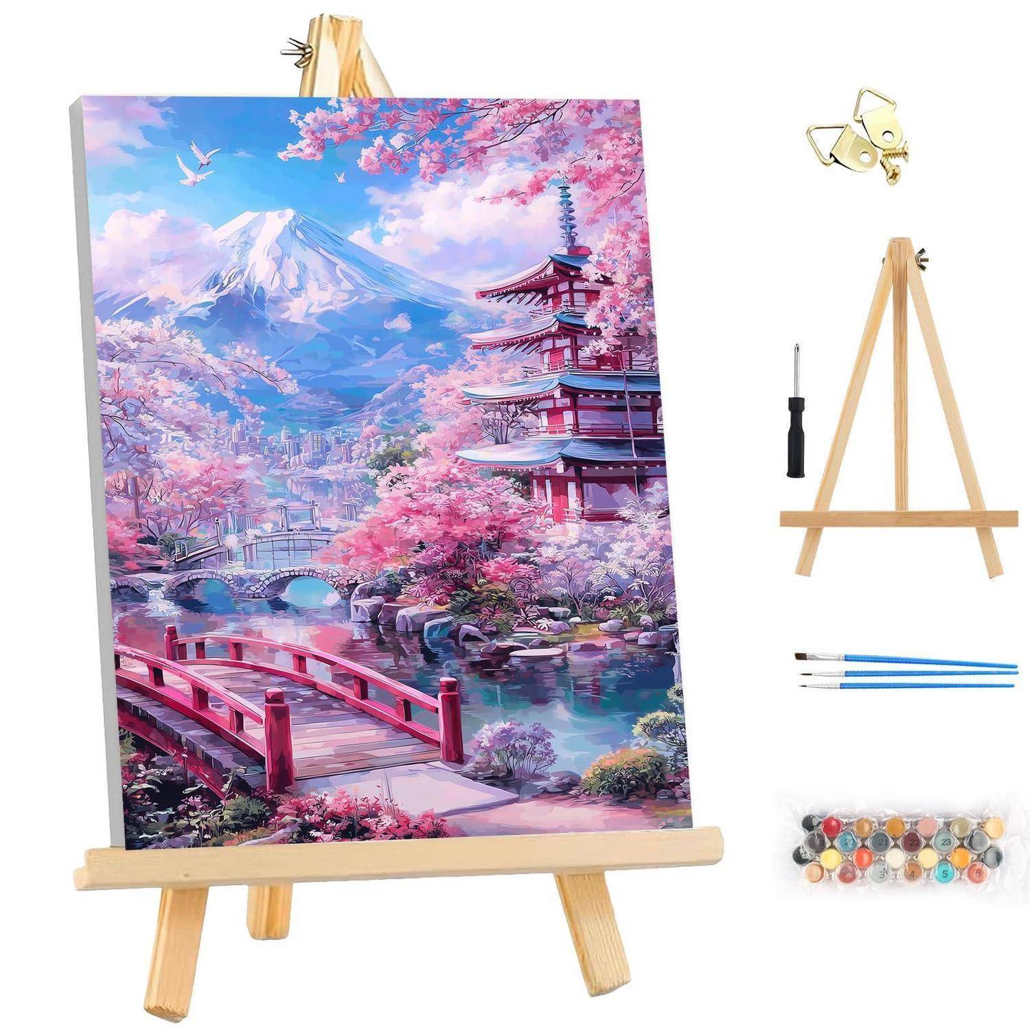 Malen-nach-Zahlen-Set mit einer japanischen Landschaft, die den Berg Fuji, Kirschblüten, eine Brücke und eine Pagode zeigt, auf einer Staffelei, mit Pinseln und Farbtöpfen im Lieferumfang enthalten.