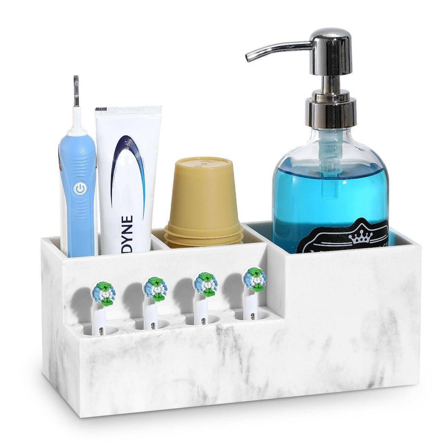 Badezimmerorganizer im Marmor-Look mit Platz für eine elektrische Zahnbürste, Zahnpasta, Becher, Seifenspender und vier Zahnbürsten.