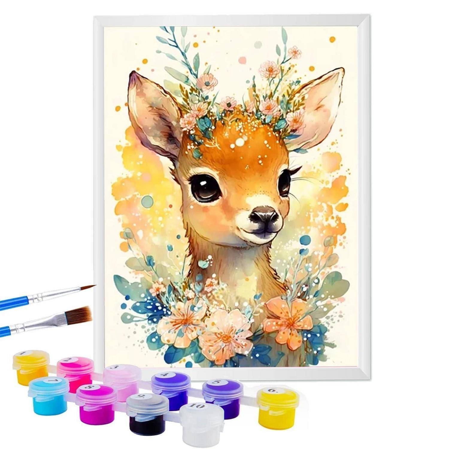 Aquarellstil-Gemälde eines Babyliebling mit Blütenkrone und Blüten, dargestellt als Kunstmaterialien-Inspiration mit Pinseln und Farbtöpfen rundherum.