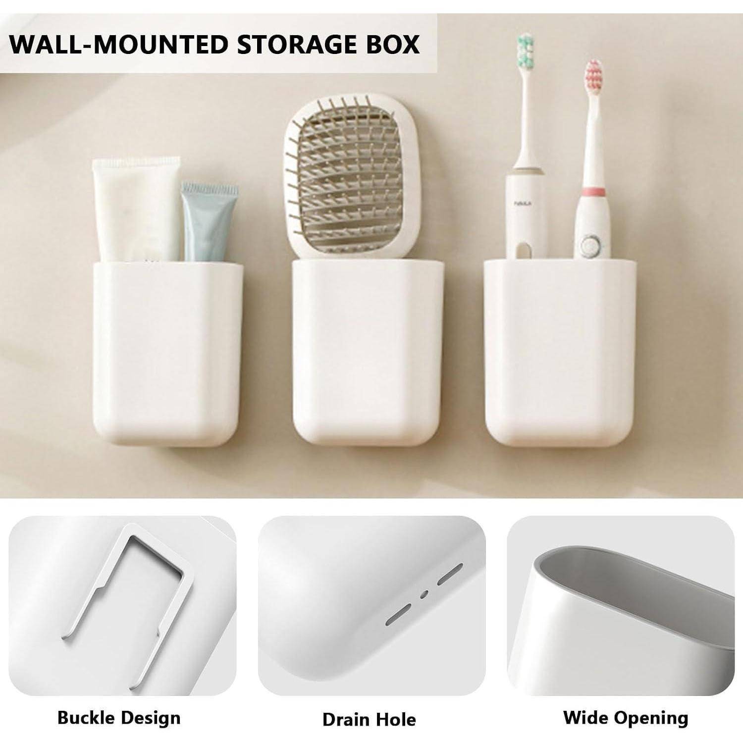 Wandmontierte weiße Aufbewahrungsbox für Zahnbürsten und Toilettenartikel; untere Paneele zeigen Schnallendesign, Abflussloch und breite Öffnung.