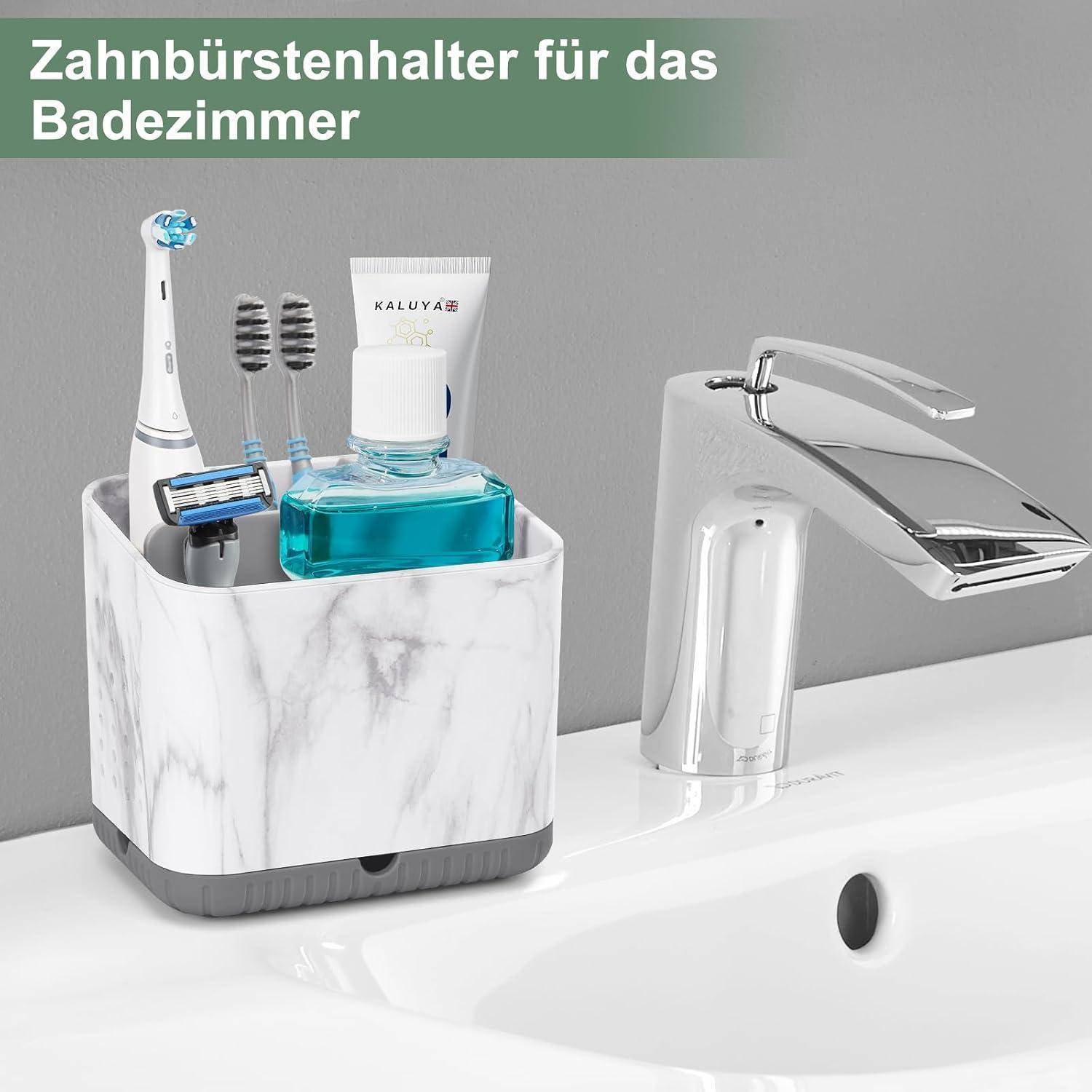 Badezimmer-Organizer mit Marmor-Optik, der eine elektrische Zahnbürste, einen Rasierer, Zahnpasta und Mundwasser neben einem Waschtischarmaturen hält; deutscher Text liest „Zahnbürstenhalter für das Badezimmer