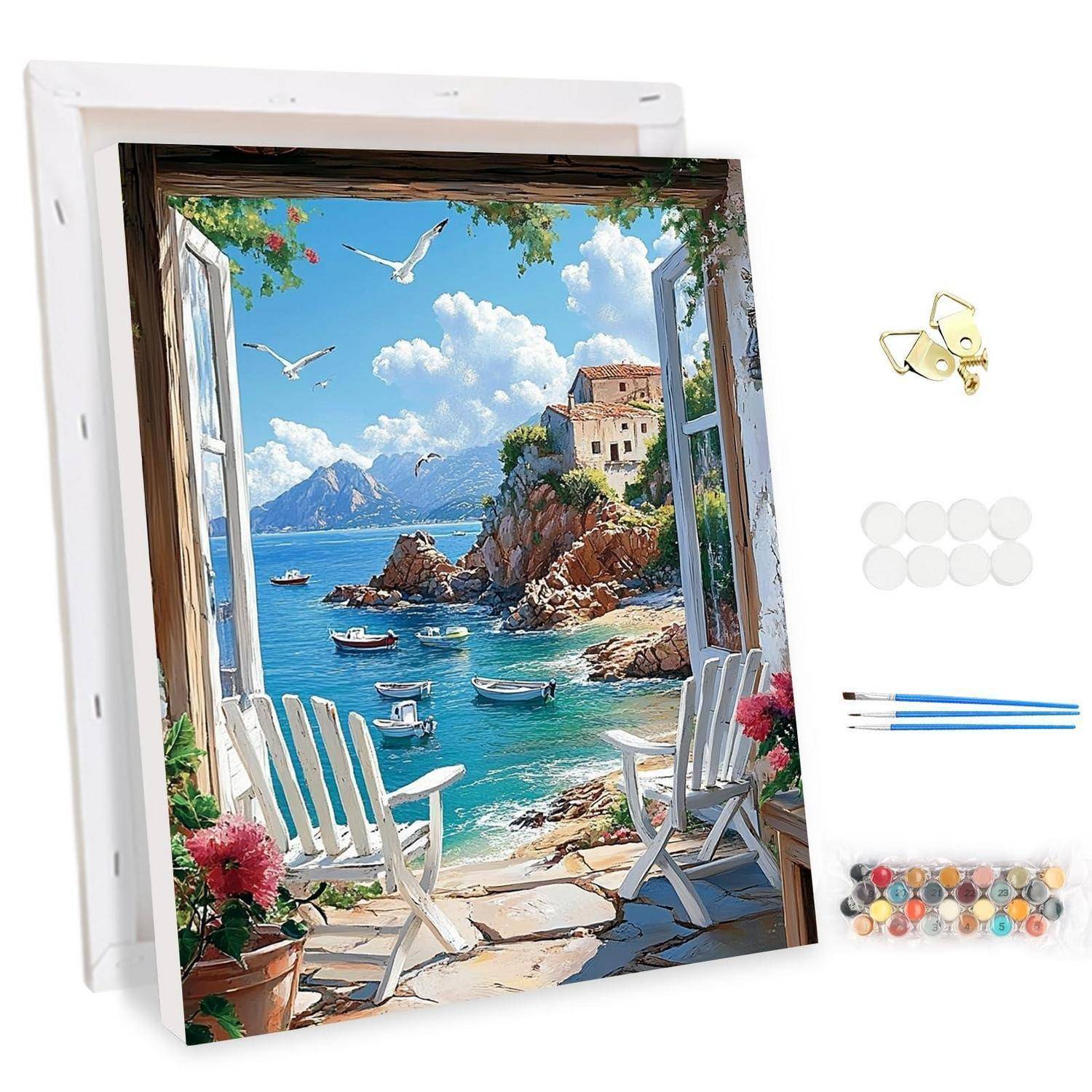 Malen-nach-Zahlen-Meereslandschaft auf gespannter Leinwand, die eine offene Strandterrasse mit Stühlen, Booten, Klippen und blauem Himmel zeigt, mit Malutensilien daneben.