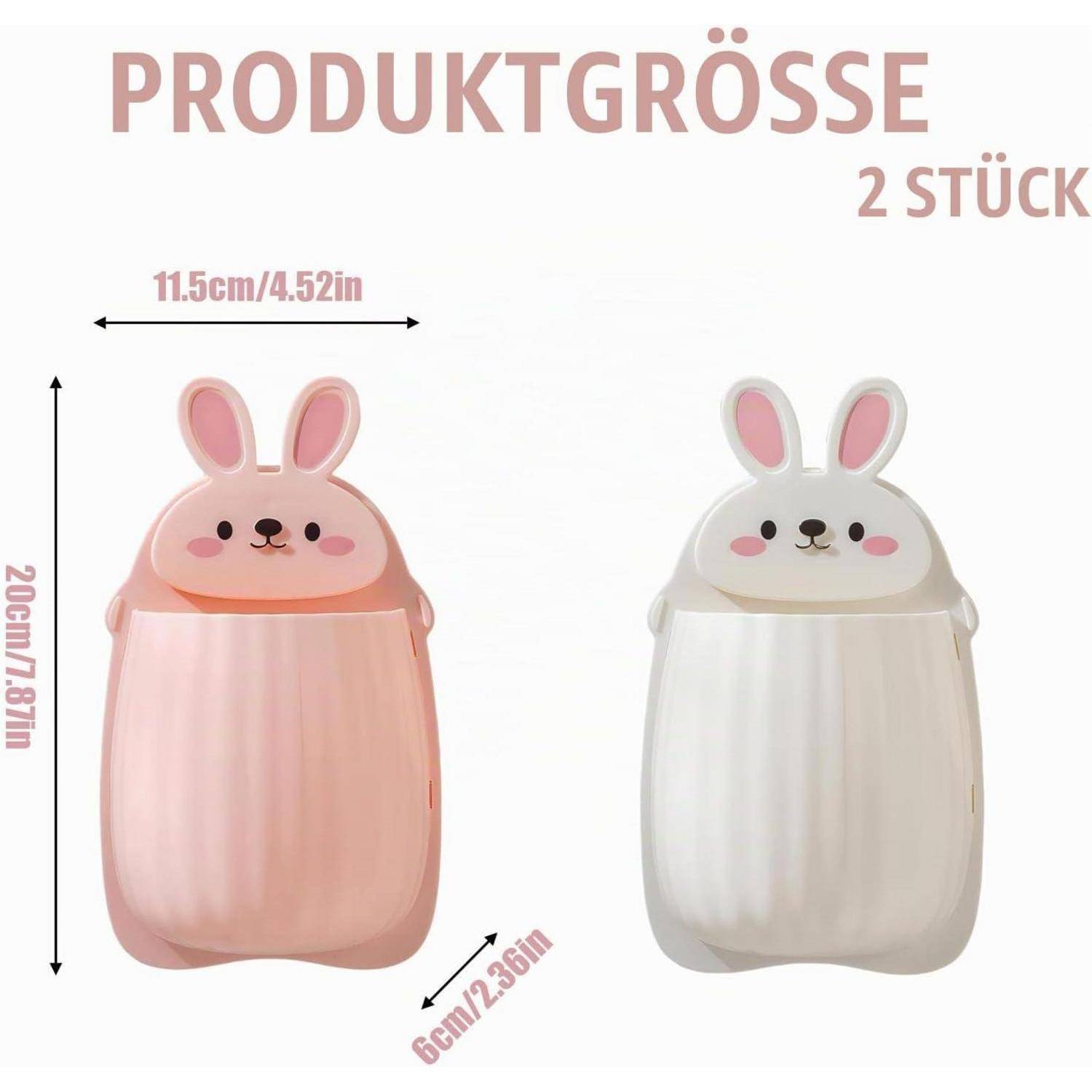 Produktgrößenabbildung mit zwei hasenförmigen Behältern, rosa und weiß, beschriftet mit 20 cm Höhe, 11,5 cm Breite und 6 cm Tiefe; Text sagt „PRODUKTGRÖSSE