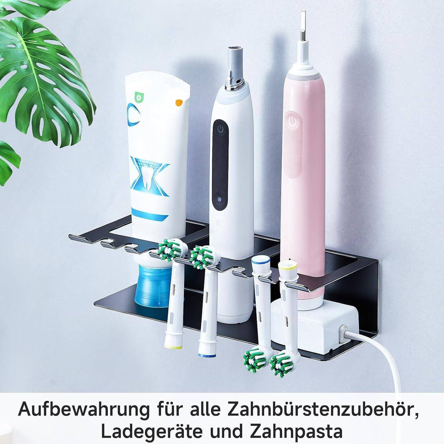 Wandmontierter Organizer mit Elektrozahnbürsten, Zahnpasta und einer Ladestation, mit darunter gelagerten Zahnburstköpfen.
