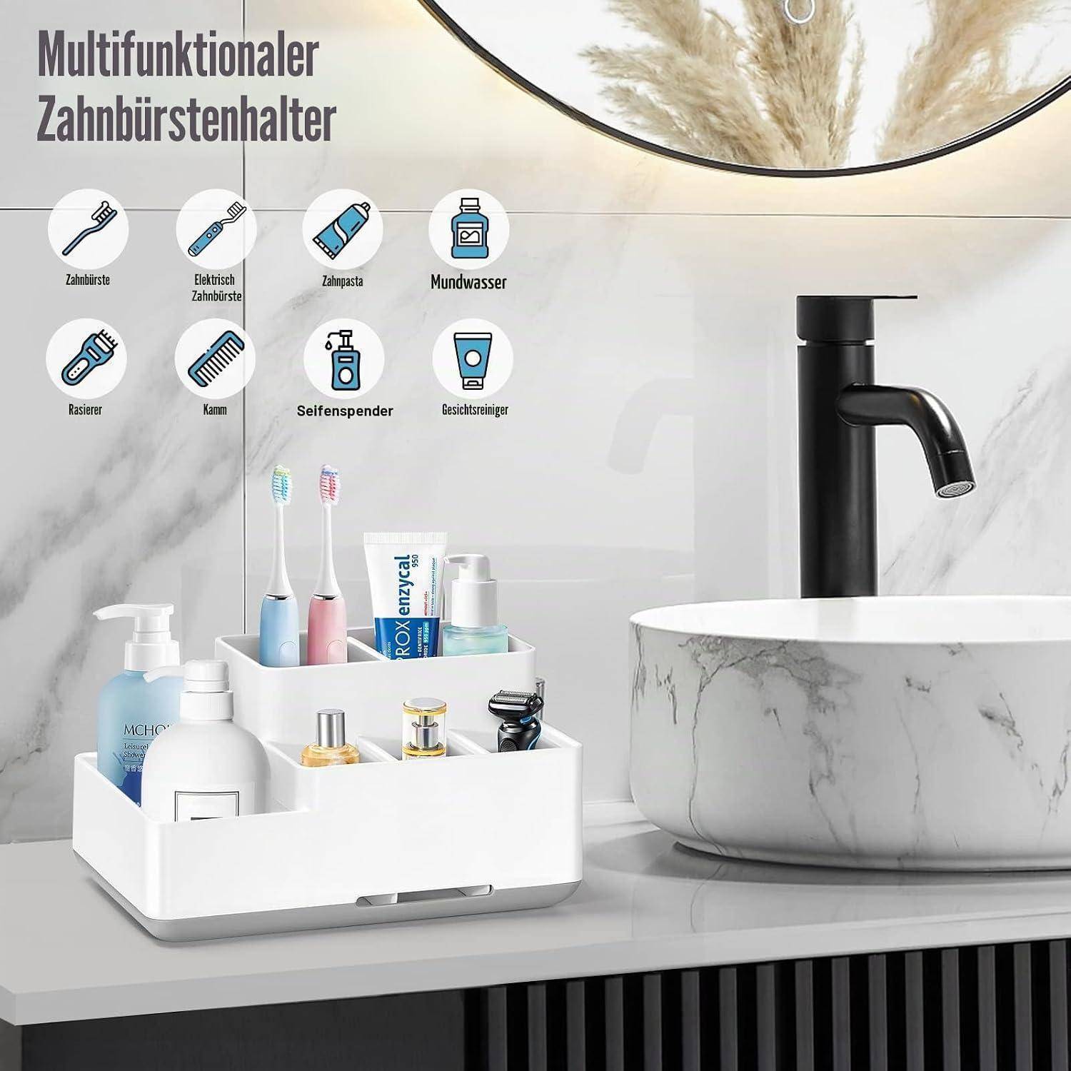 Multifunktionaler weißer Badezimmerorganizer, der Zahnbürsten, Zahnpasta, Seifenspender und Toilettenartikel neben einem Waschbecken und einer Armatur hält; auf Deutsch als „Multifunktionaler Zahnbürstenhalter