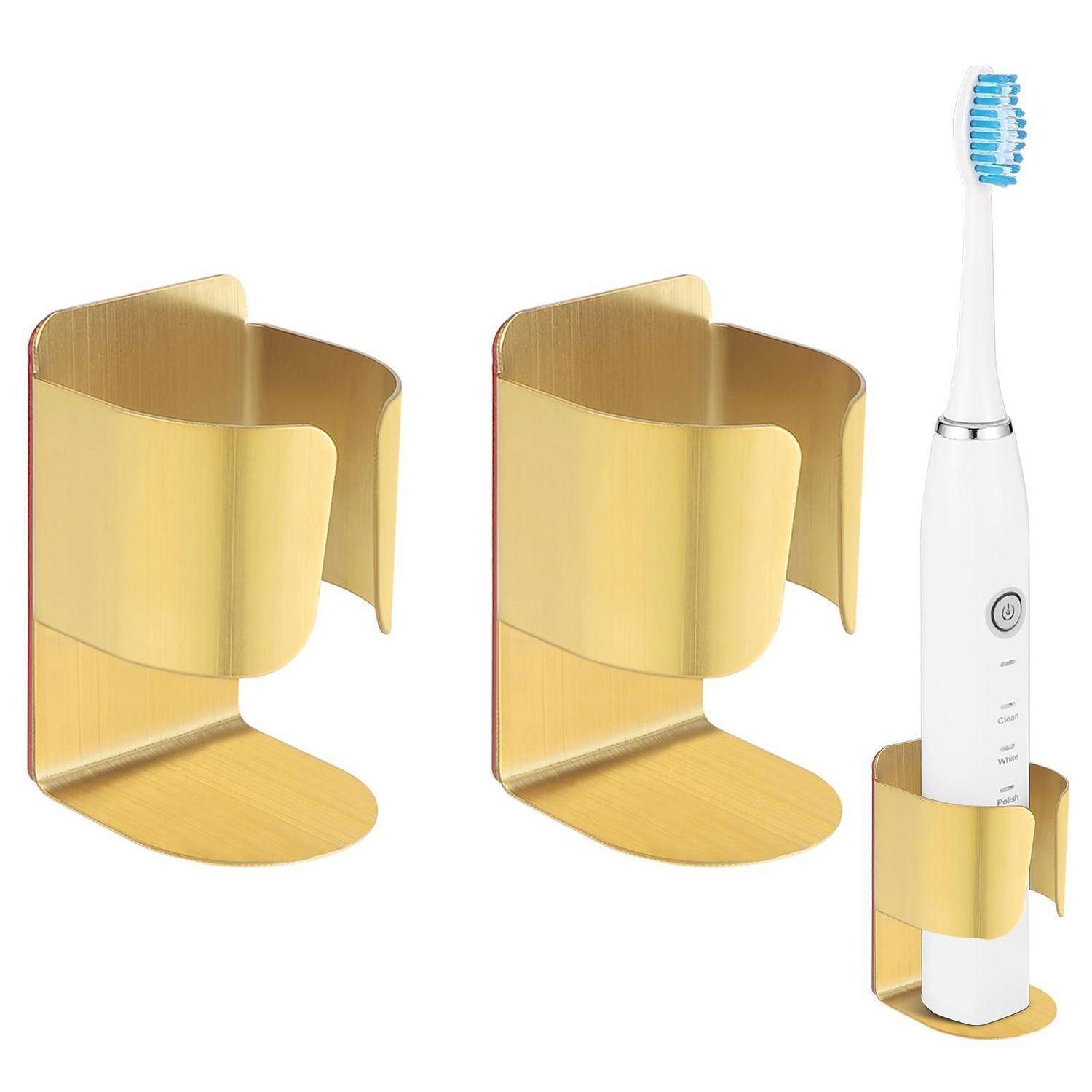 Goldene wandmontierte Zahnbürstenhalter, von der Seite gezeigt, mit einer elektrischen Zahnbürste in einem Halter.