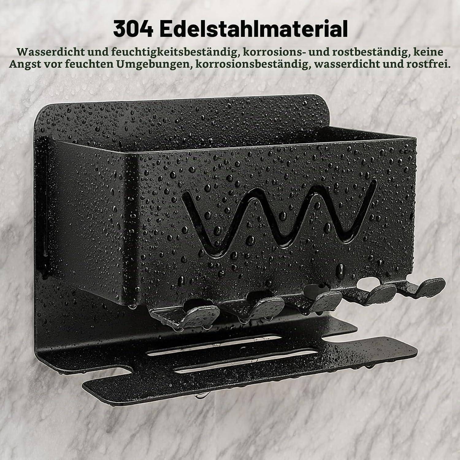 Schwarzes Wandregal aus Edelstahl 304 mit Entwässerungsschlitzen, nass mit Wassertropfen abgebildet; deutscher Text besagt, dass es wasserdicht, korrosionsbeständig und rostfrei ist.