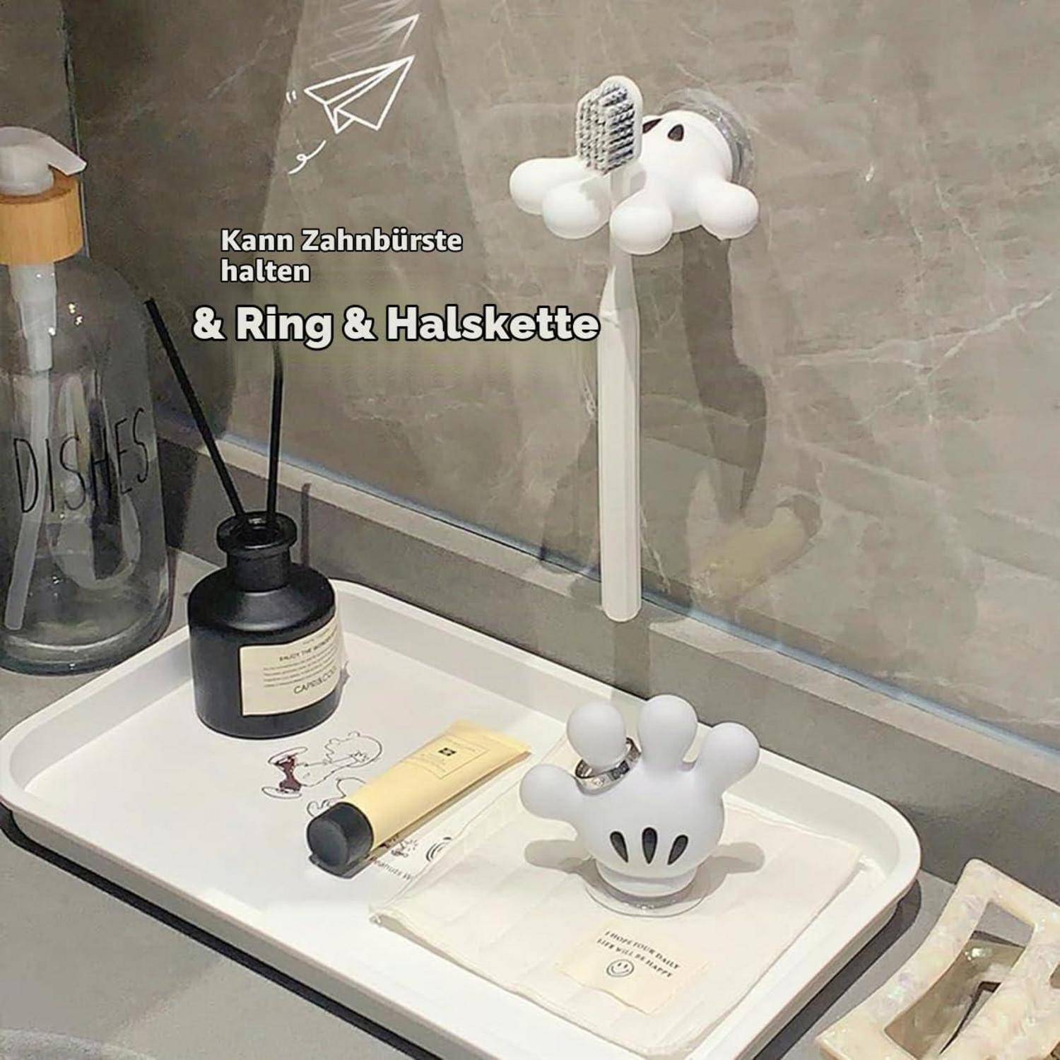 Badezimmer-Waschbecken-Tablett mit wandmontiertem Zahnbürstenhalter und handförmigem Ringhalter; der Text sagt „Kann Zahnbürste halten & Ring & Halskette