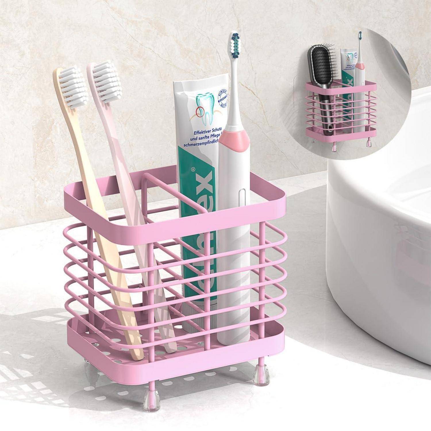 Rosa Metallablage für Zahnbürsten, die Zahnbürsten, Zahnpasta und eine elektrische Zahnbürste im Badezimmer hält; die Einfügung zeigt den Organizer aus einem anderen Winkel.