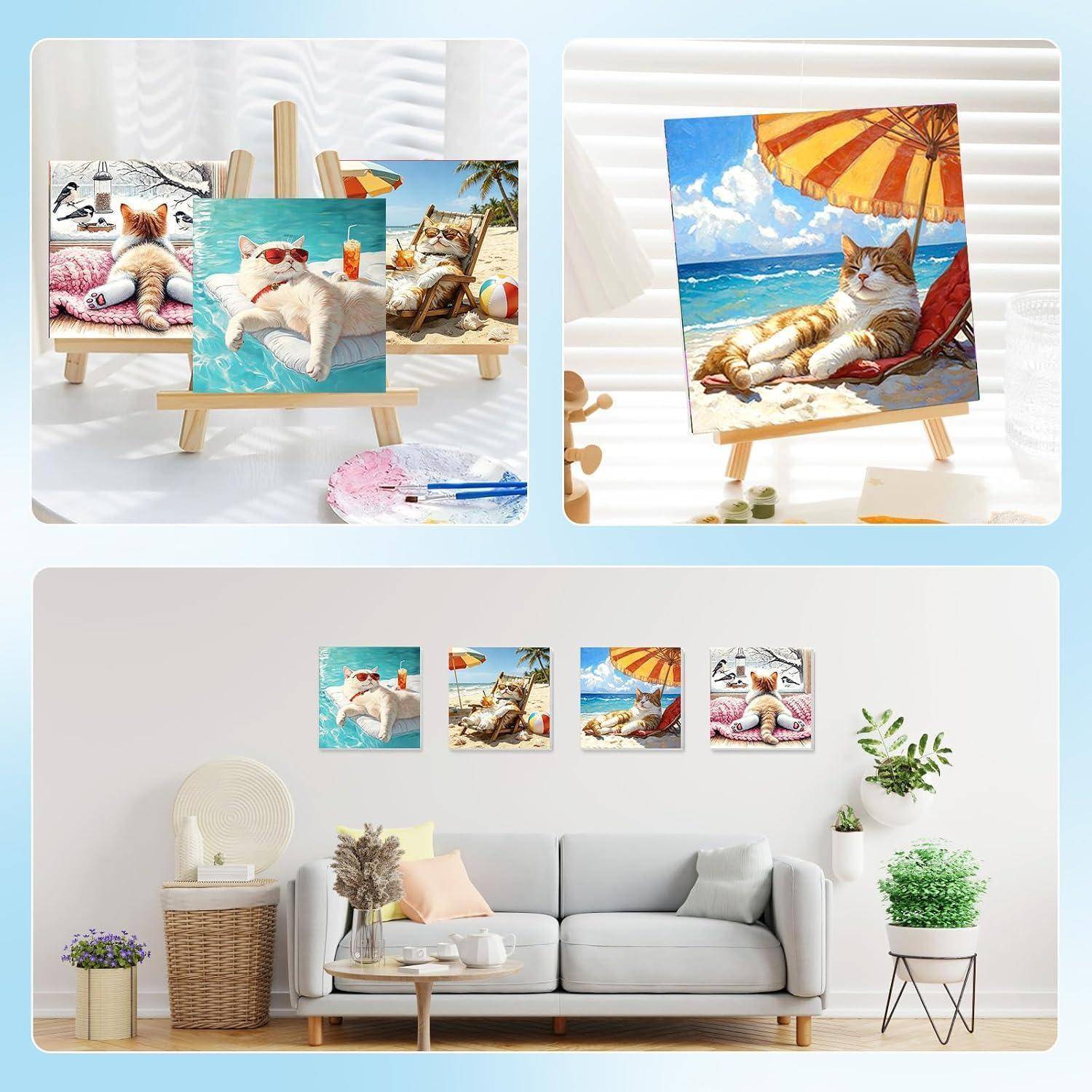 Katzenmotiv-Leinwanddrucke auf Mini-Staffeleien und eine Wanddisplay, die entspannte Katzen in Strandszenen und eine fläzende Katze in einem Zimmer zeigen.