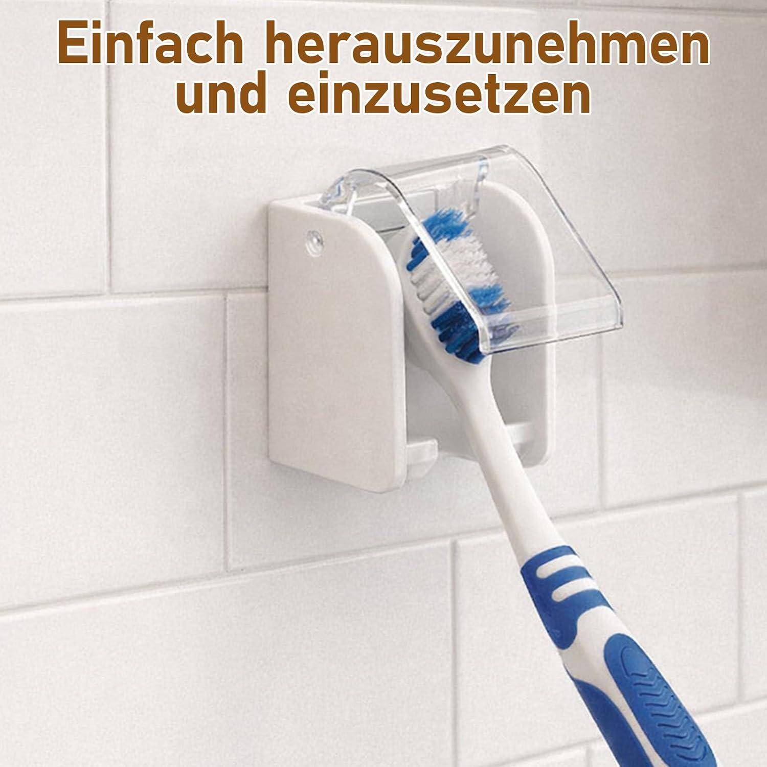 Zahnbürste in einem wandmontierten Halter mit durchsichtiger Abdeckung, dargestellt als leicht zu entfernen und einzusetzen; deutscher Text lautet 