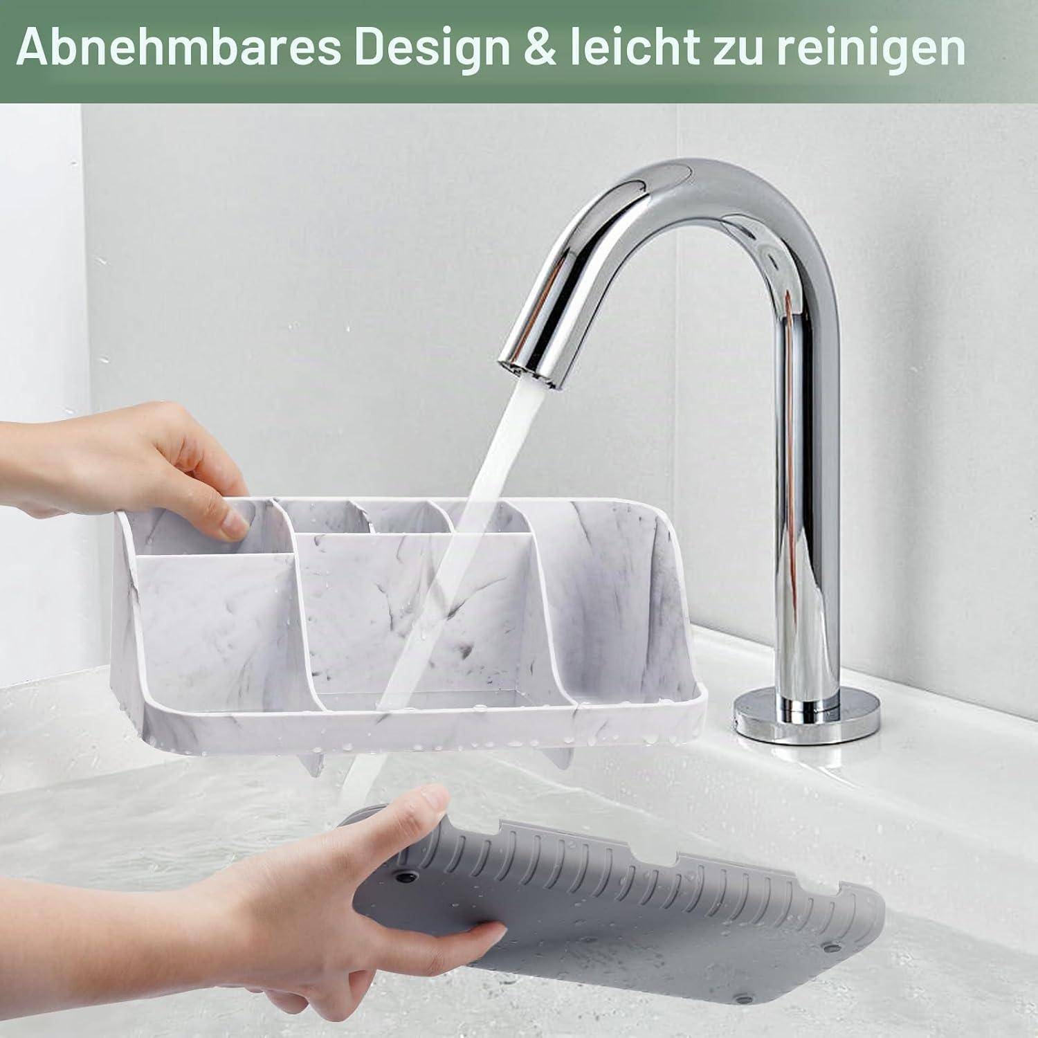 Hände spülen einen abnehmbaren grauen Spülbecken-Caddy unter fließendem Wasser ab, um das leicht zu reinigende Design zu zeigen; deutscher Text lautet „Abnehmbares Design & leicht zu reinigen