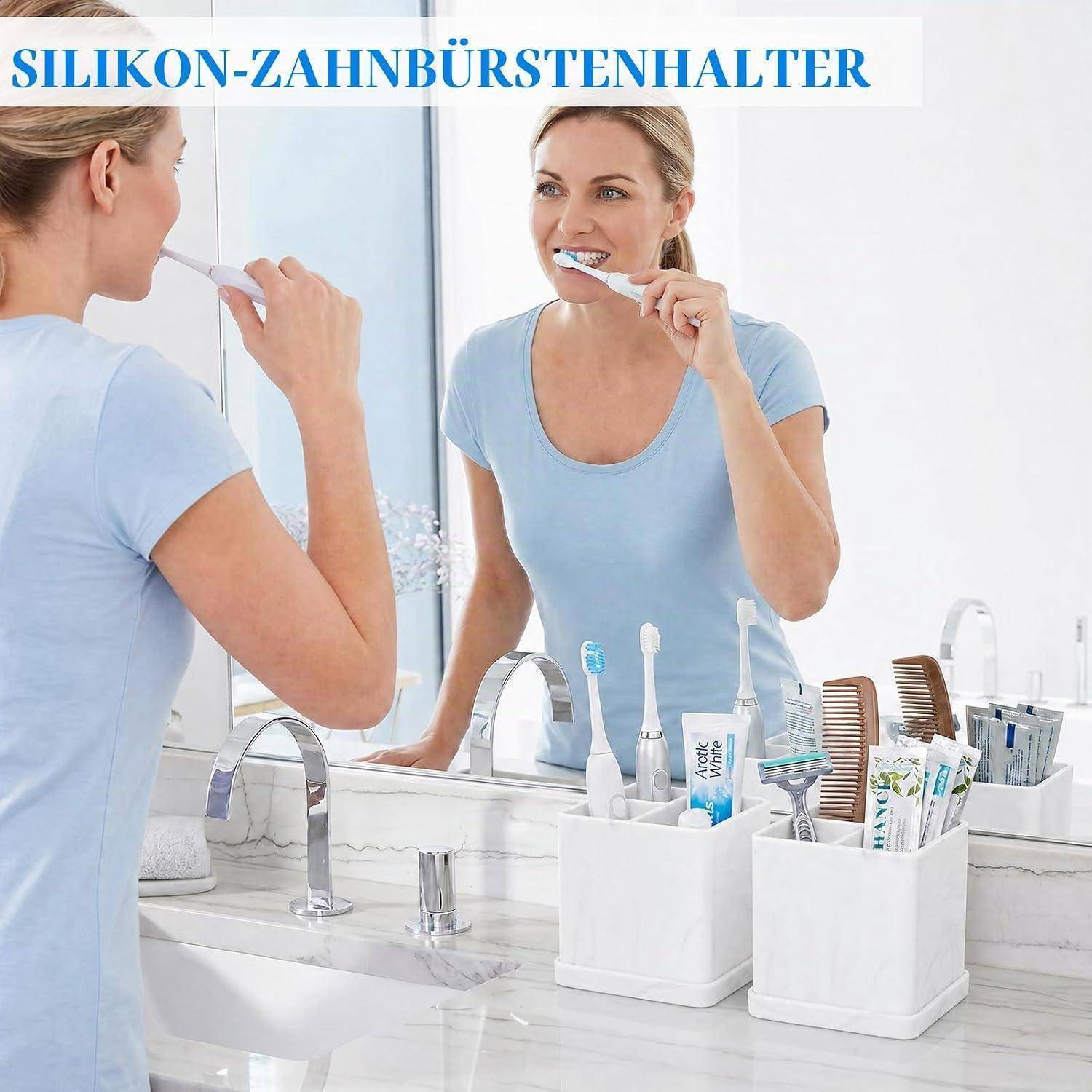 Frau putzt sich die Zähne an einem Badezimmerbecken neben Organizer mit der Aufschrift 'SILIKON-ZAHNBÜRSTENHALTER', die Zahnbürsten und Zahnpasta halten.