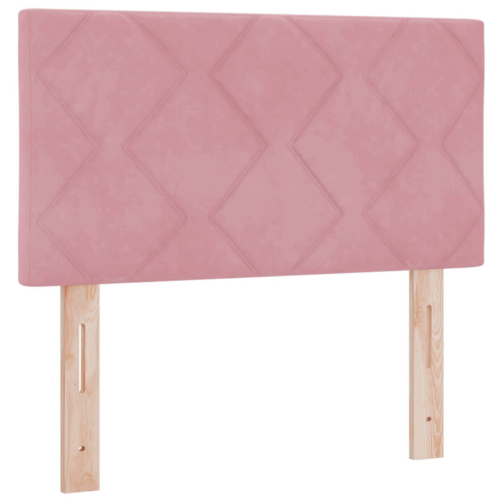 Rosa gepolstertes Kopfteil mit Rautensteppung und zwei hellem Holz verstellbaren Pfosten.