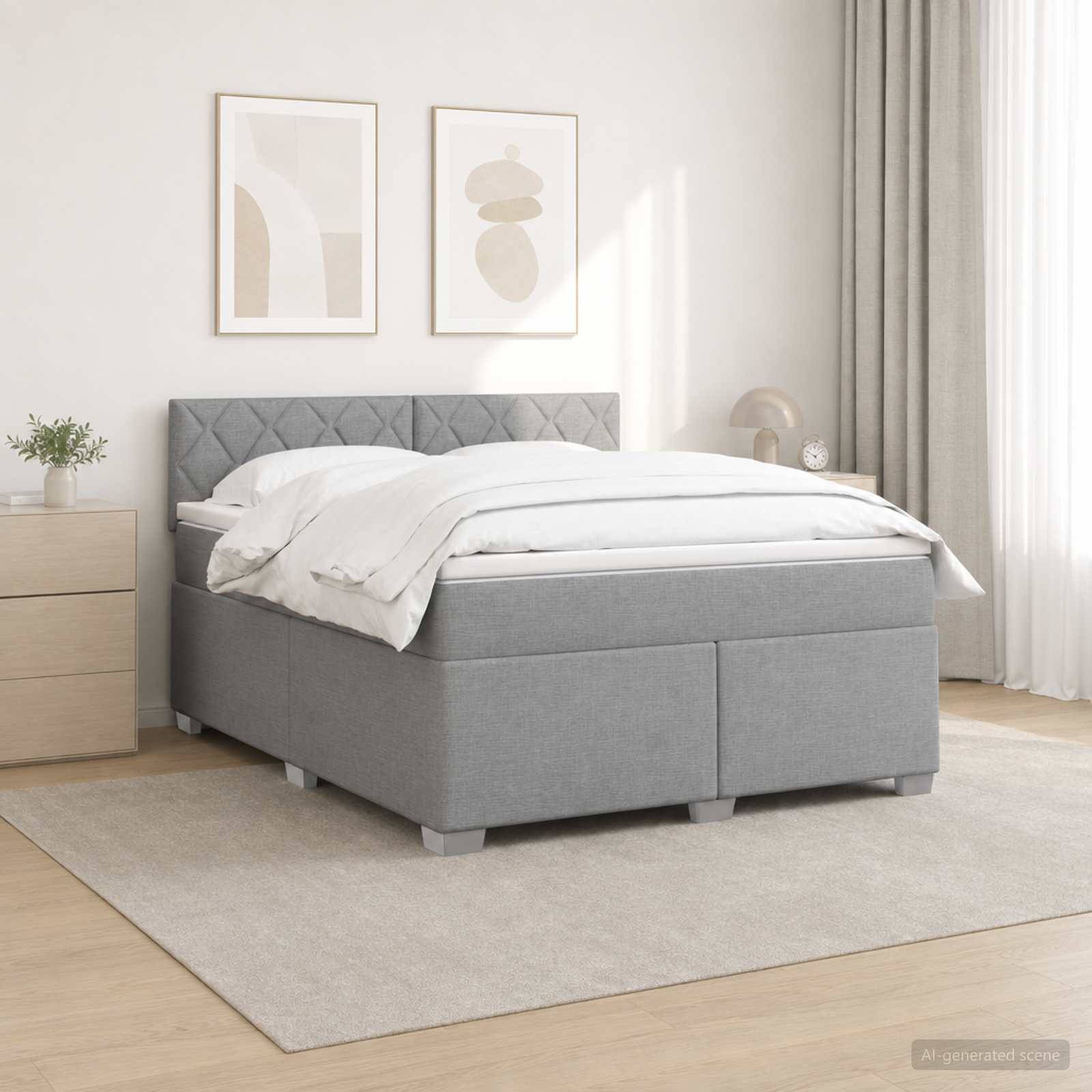 Grau gepolstertes Bett mit gestepptem Kopfteil, weiße Bettwäsche und neutrale Schlafzimmerdekoration, gezeigt in einem hellen modernen Zimmer mit gerahmter Wandkunst und einem Nachttisch.