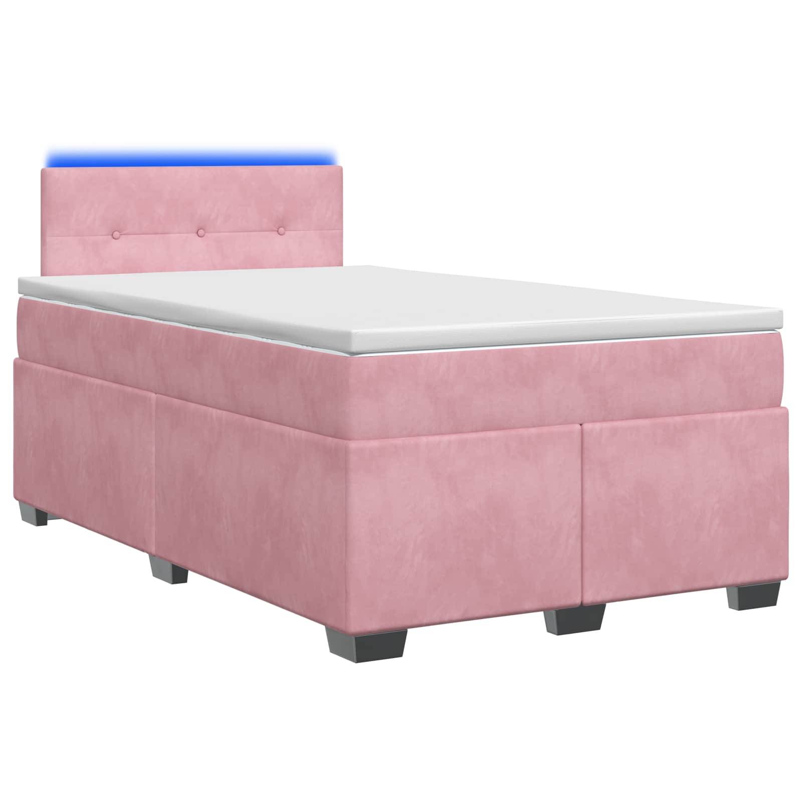 Rosa gepolstertes Einzelbett mit weißer Matratze und gestepptem Kopfteil, auf einem einfachen weißen Hintergrund gezeigt.