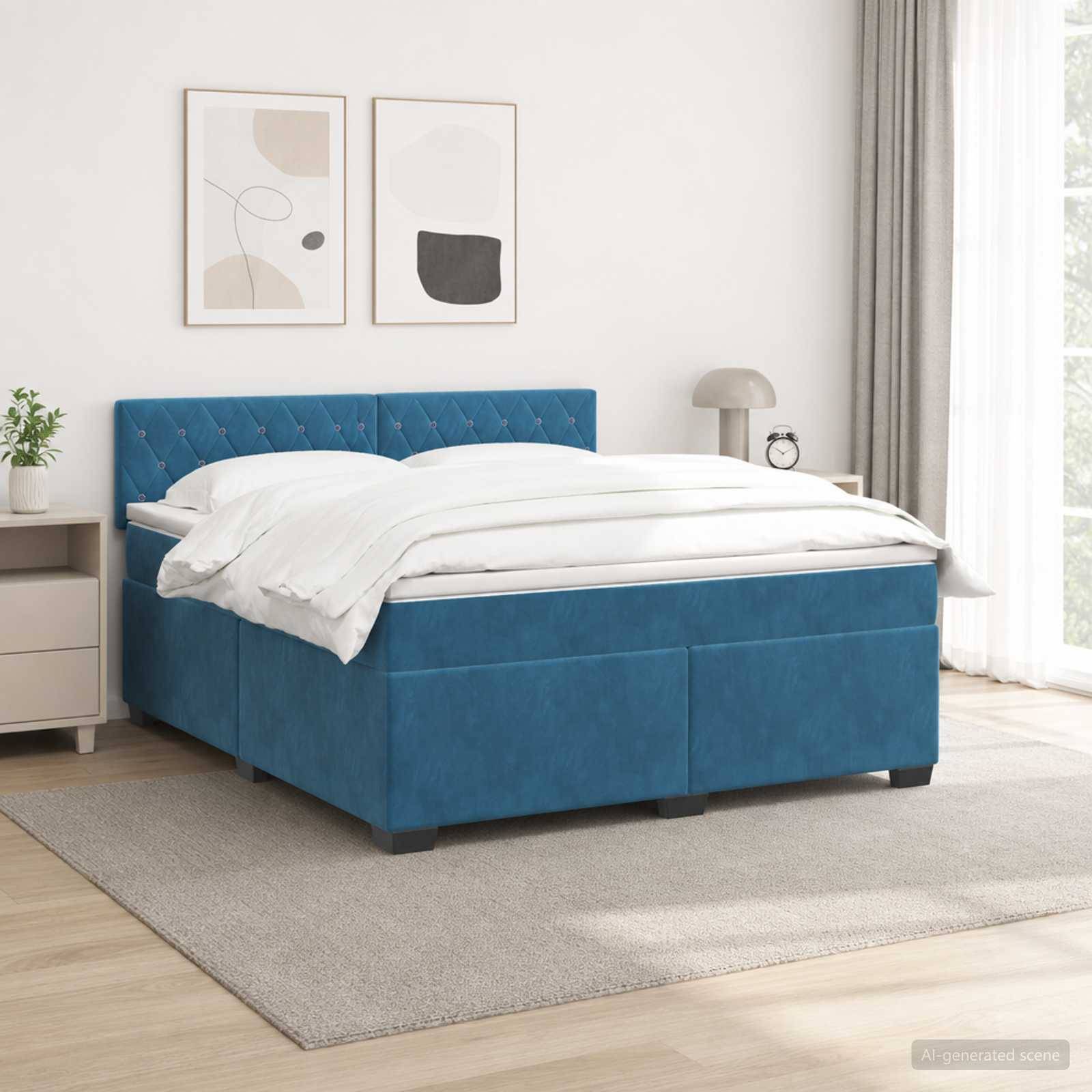 Blaubezogenes Bett mit weißer Bettwäsche in einem hellen, minimalistischen Schlafzimmer, gezeigt mit Nachttischen, Lampe, Kunstwerk und Teppich.