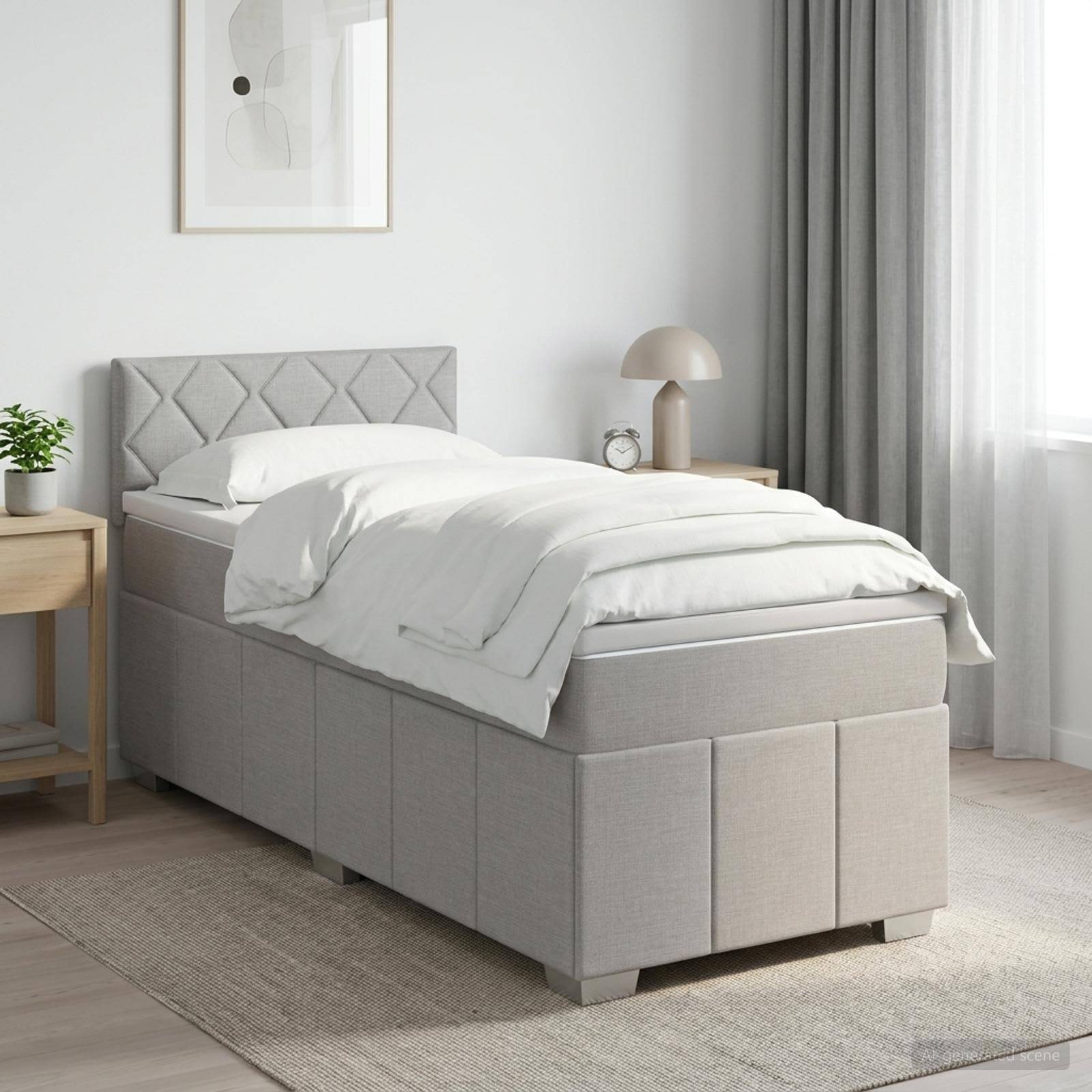 Ein sauber gemachtes Einzelbett mit gepolstertem grauem Kopfteil mit Knopfsteppung und passendem Stauraum-Unterbau in einem hellen, minimalistischen Schlafzimmer.