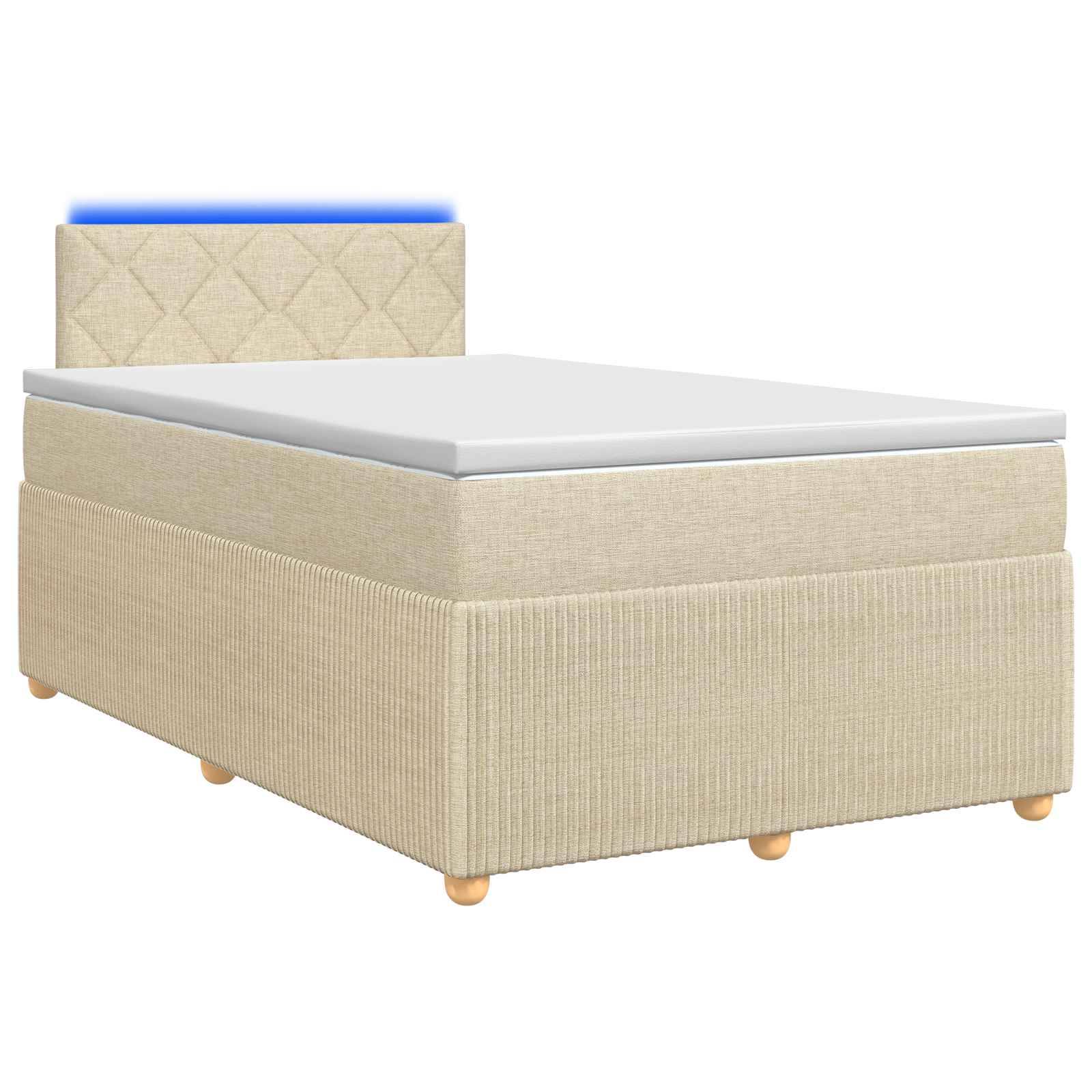 Beige gepolstertes Einzelbett mit Matratze und gestepptem Kopfteil, gezeigt auf weißem Hintergrund.