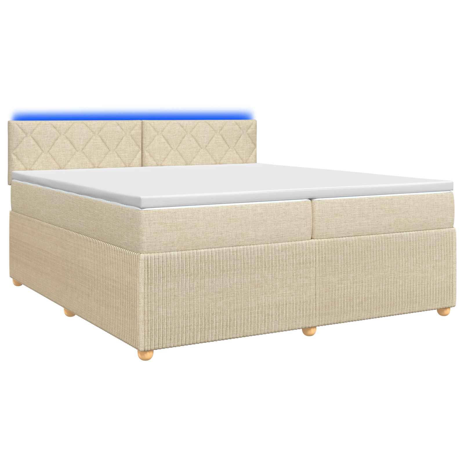 Beige gepolstertes Bett mit Matratze und gepolstertem Kopfteil auf weißem Hintergrund.