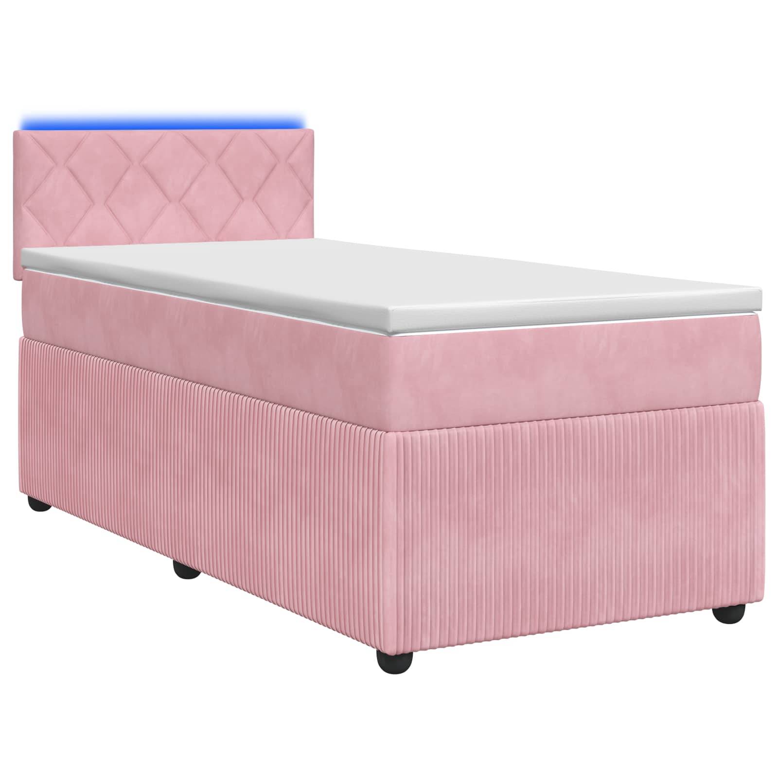 Rosa gepolstertes Einzelbett mit Matratze und gestepptem Kopfteil auf weißem Hintergrund.