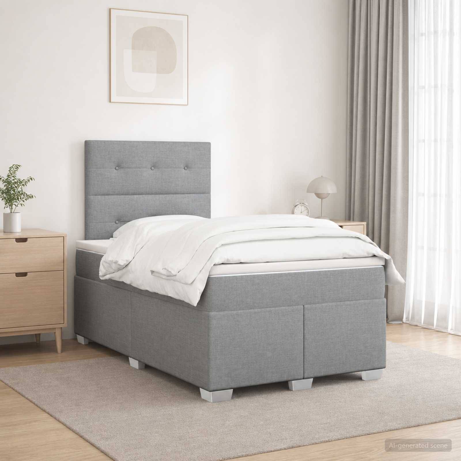 Modernes Schlafzimmer mit einem grau gepolsterten Bett, weißer Bettwäsche, Nachttischen, Lampe, gerahmter Wandkunst, Vorhängen und einem hellen Teppich.