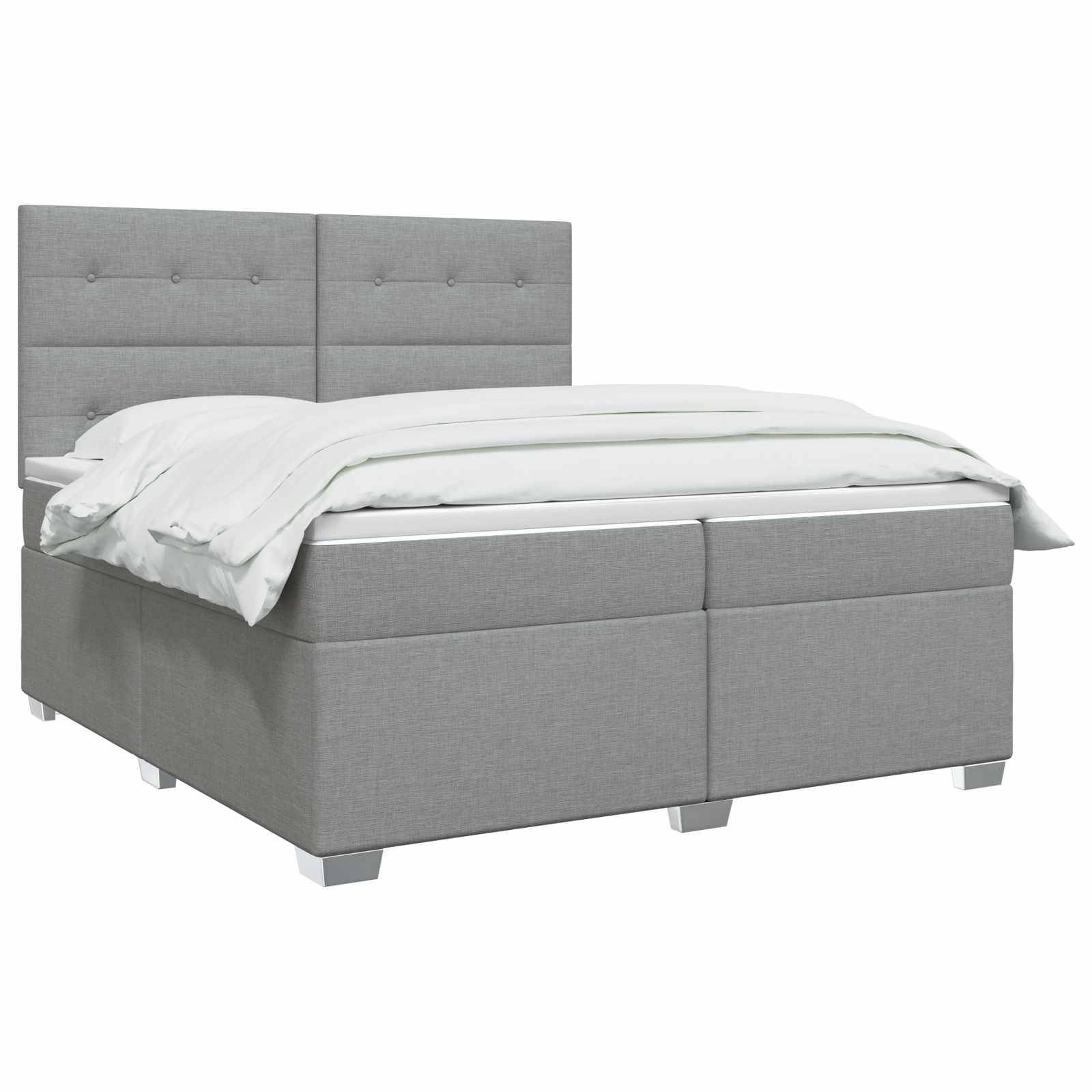 Grau gepolstertes Bett mit gestepptem Kopfteil und weißer Bettwäsche, auf weißem Hintergrund abgebildet.
