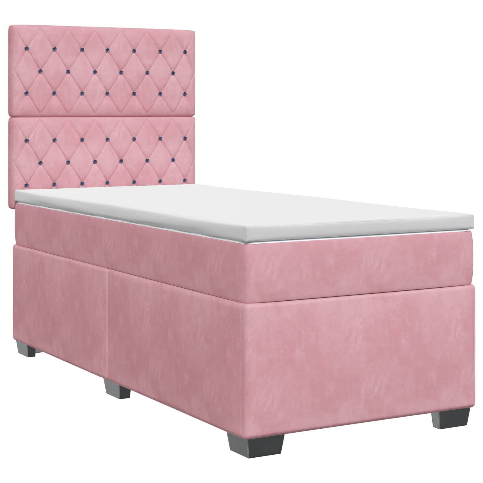 Rosa gepolstertes Ottomane-Bett mit gestepptem, gestuftem Kopfteil und weißer Matratze auf grauem Sockel.