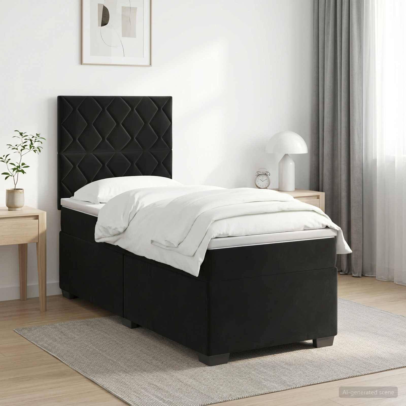 Schwarzes gepolstertes Einzelbett mit rautengestepptem Kopfteil, weiße Bettwäsche und passende Schlafzimmermöbel in einem hellen, modernen Zimmer.
