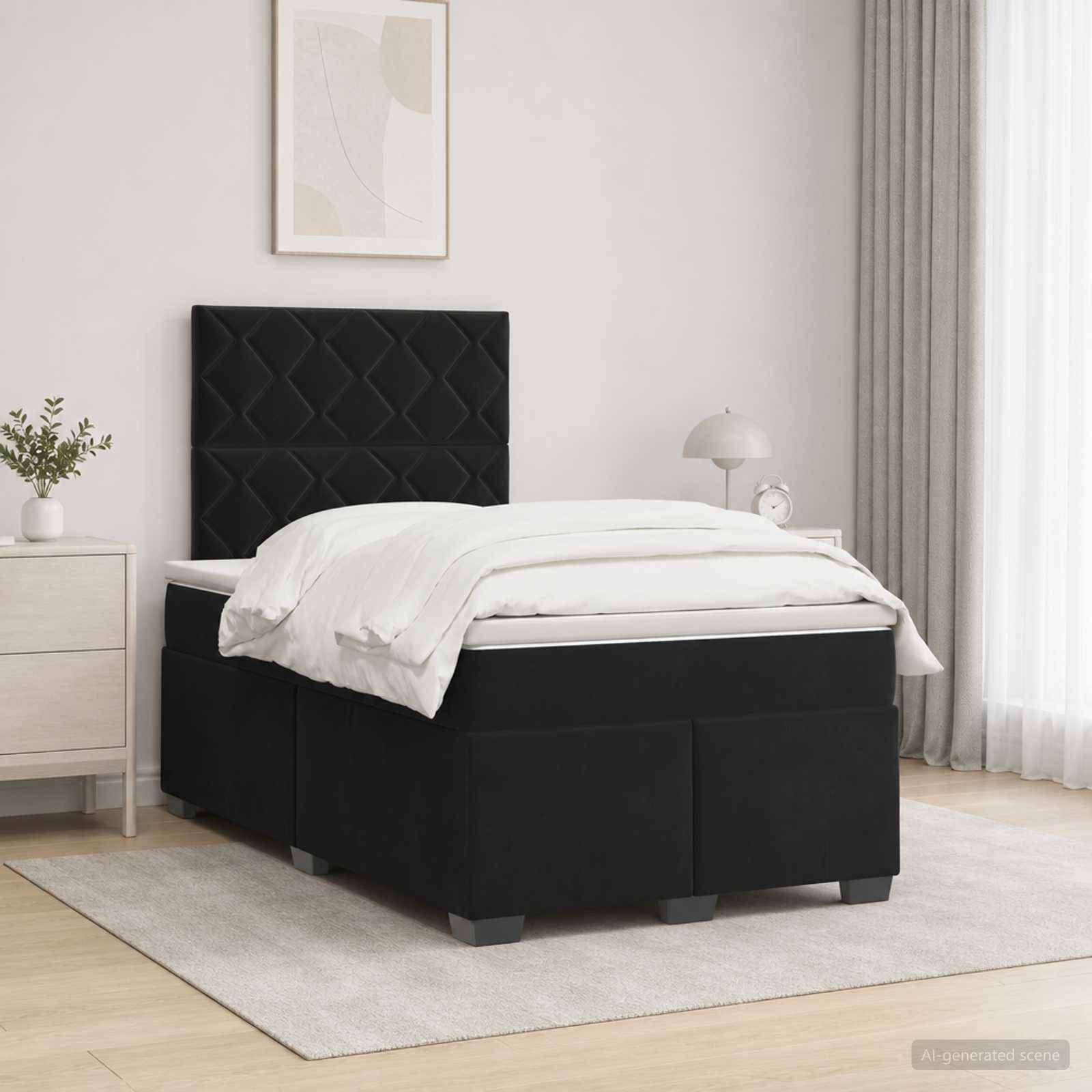 Schwarzes gepolstertes Bett mit gestepptem Kopfteil, weiße Bettwäsche und ein kleines Nachttischchen in einem hellen minimalistischen Schlafzimmer.