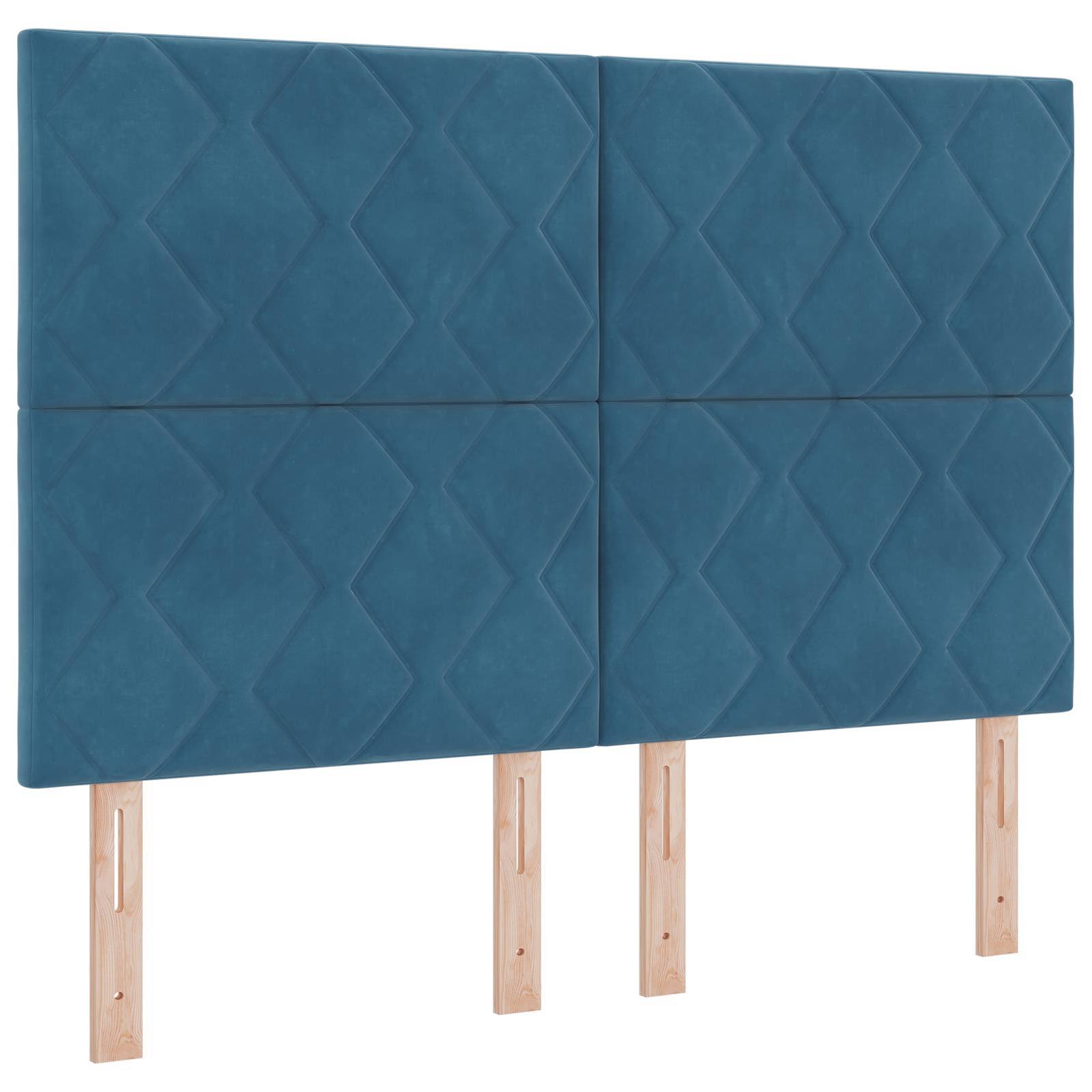 Kopfkissen in Blau mit Polsterung, Rautensteppung und vier hellen Holzbeinen, vor weißem Hintergrund gezeigt.